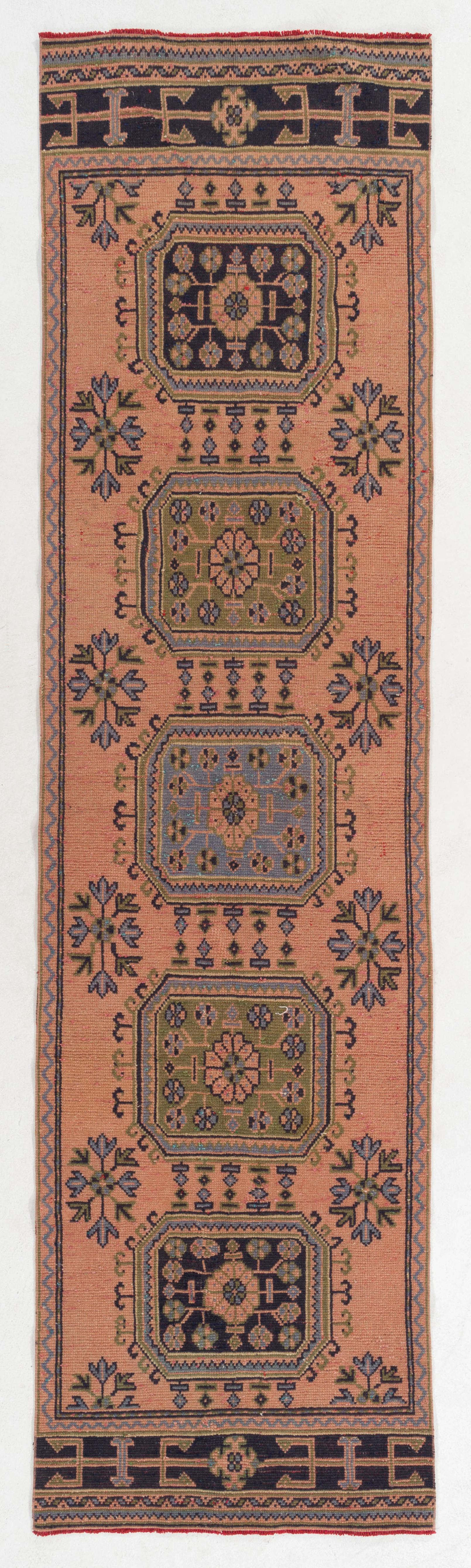 A vintage Turkish runner rug. Finely hand-knotted with even medium wool pile on wool foundation. Very good condition. Sturdy and as clean as a brand new rug (deep washed professionally). Size: 3 x 11.7 ft.
   