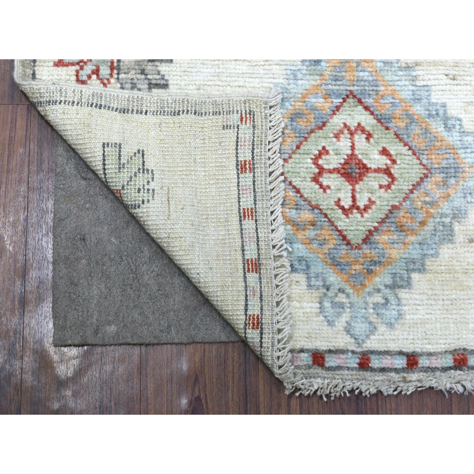 This is a truly genuine one-of-a-kind Hand Knotted Gray Anatolian Village Inspired with Large Medallions Design Extra Soft Wool Oriental Wide Runner Rug. It has been Knotted for months and months in the centuries-old weaving craftsmanship techniques