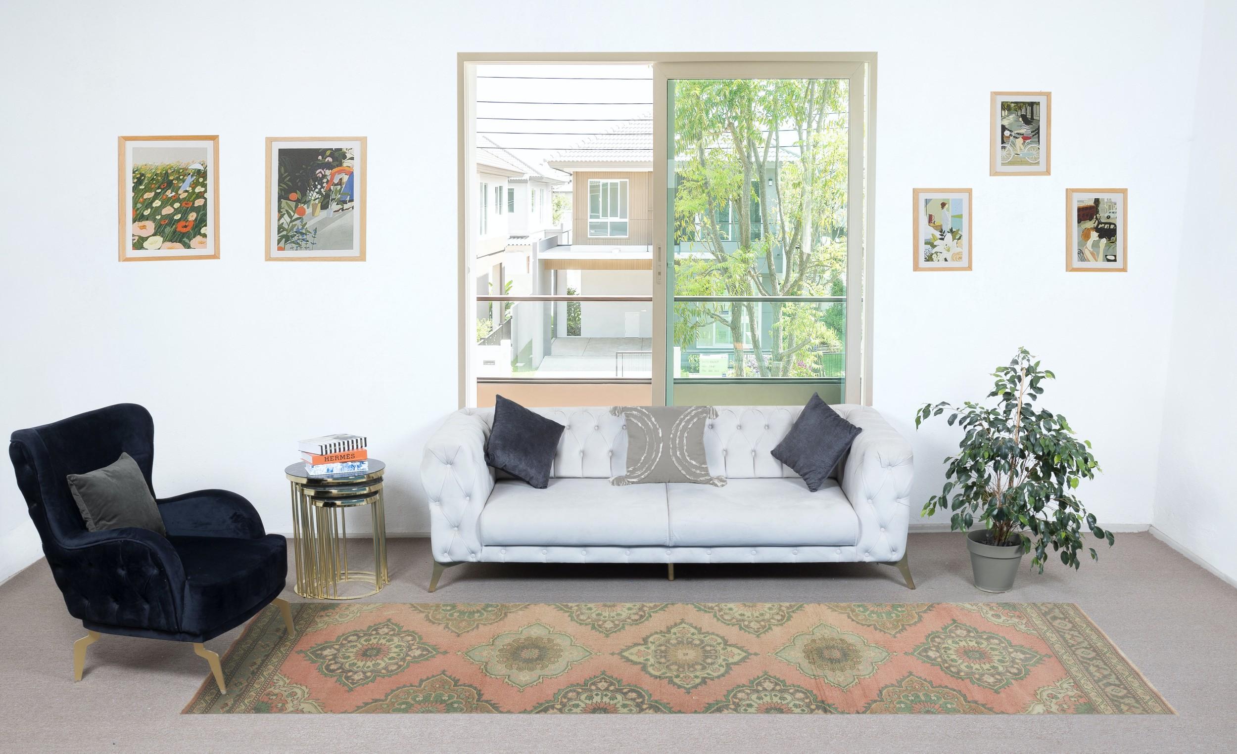 Enhance your home with the authentic charm of this vintage handknotted Turkish wool runner rug, a masterpiece of traditional Anatolian craftsmanship. 

Crafted from 100% high-quality wool, this runner rug offers exceptional durability, warmth, and a