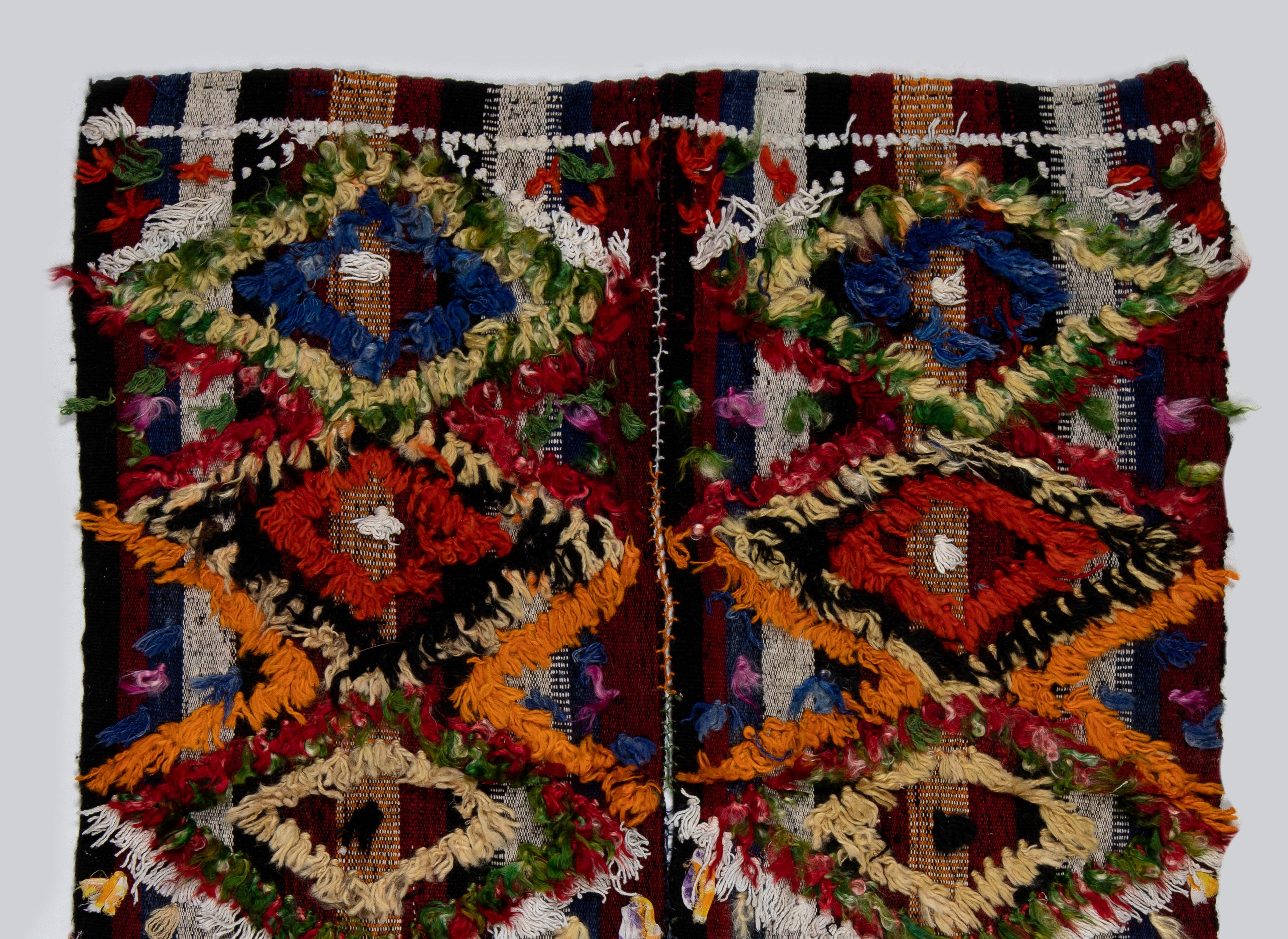 This lively handwoven rug was produced by Kurdish villagers in Central Turkey for daily use in third quarter of the 20th century. These splendid vintage weavings were used in various ways such as wall-hangings, bedding covers, tent dividers,