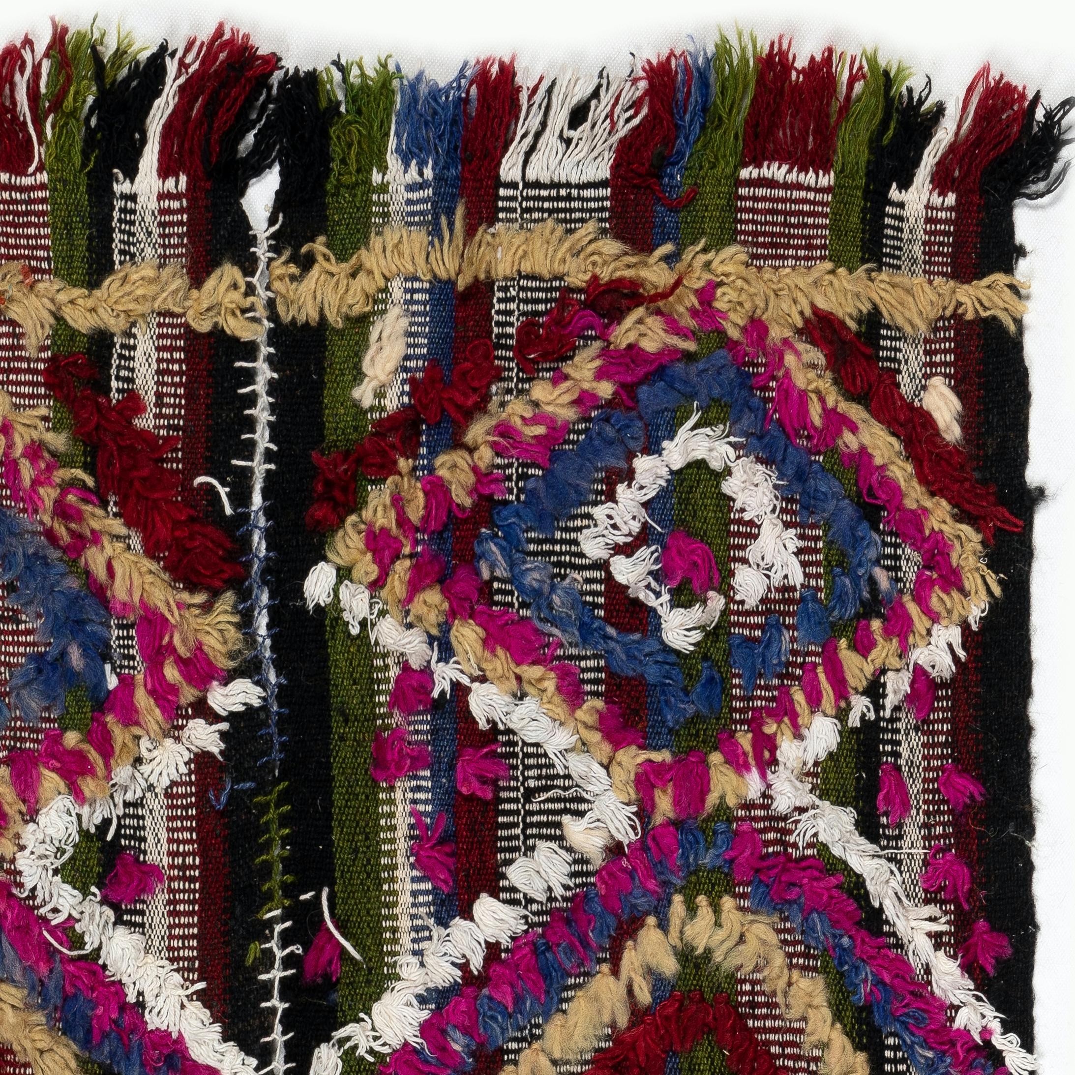 This lively handwoven rug was produced by Kurdish villagers in Central Turkey for daily use in third quarter of the 20th century. These splendid vintage weavings were used in various ways such as wall-hangings, bedding covers, tent dividers,