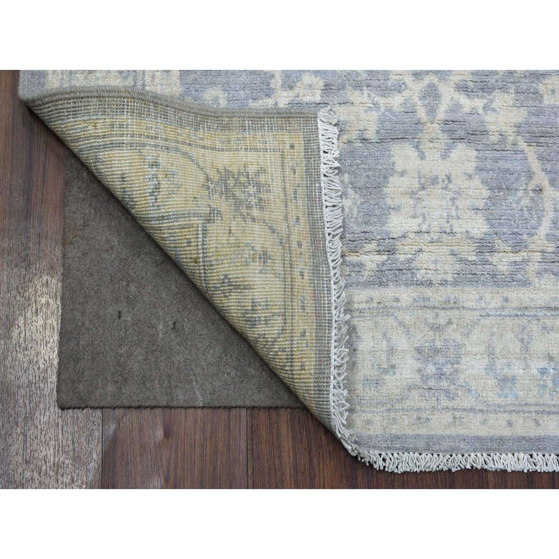 This is a truly genuine one-of-a-kind Gray Pure Wool Natural Dyes Hand Knotted, Stone Wash Peshawar Oriental Rug. It has been Knotted for months and months in the centuries-old weaving craftsmanship techniques by expert artisans.
Primary materials: