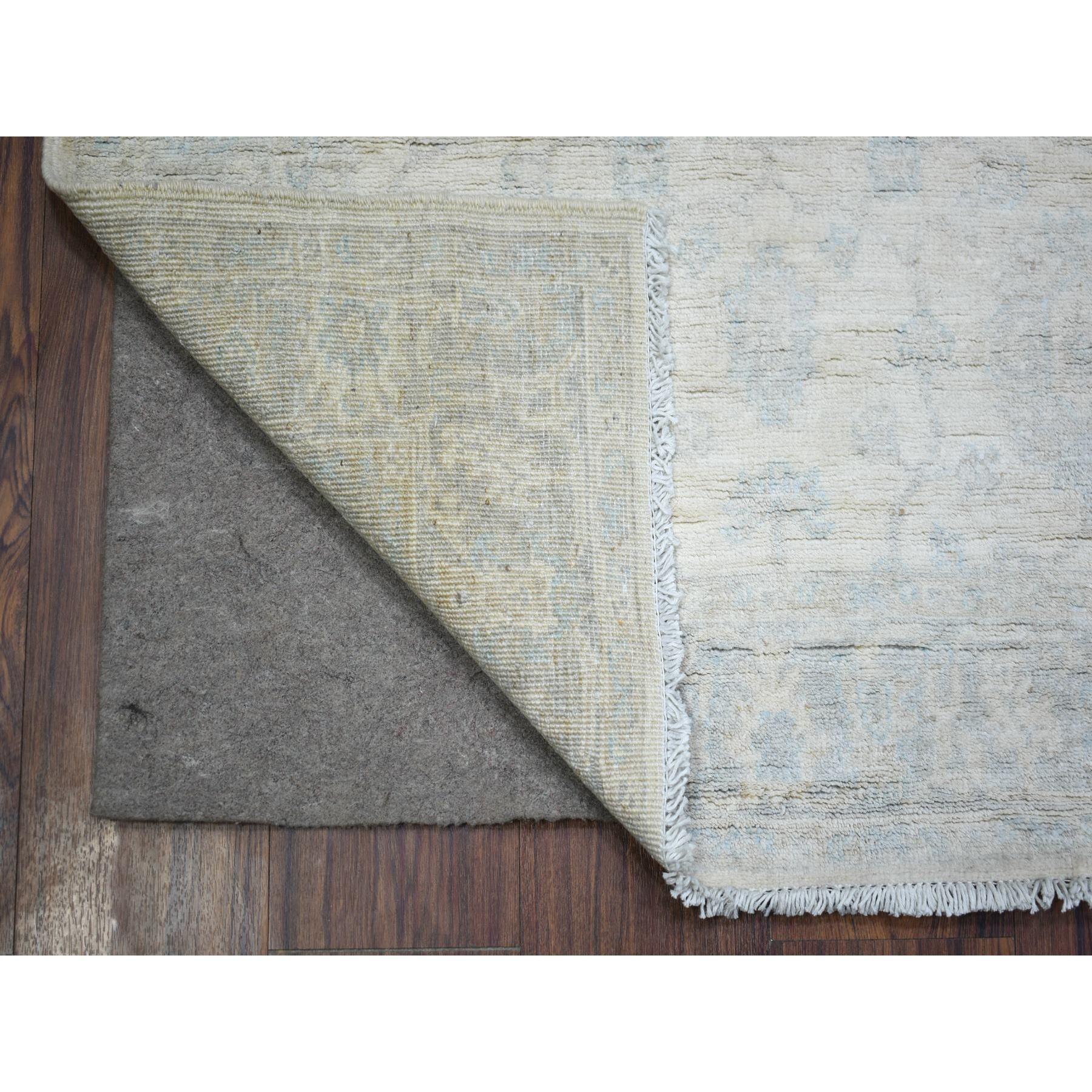 This is a truly genuine one-of-a-kind Ivory, Hand Knotted Heavily Washed Peshawar, Pure Wool, Oriental Rug. It has been Knotted for months and months in the centuries-old weaving craftsmanship techniques by expert artisans.
Primary materials: