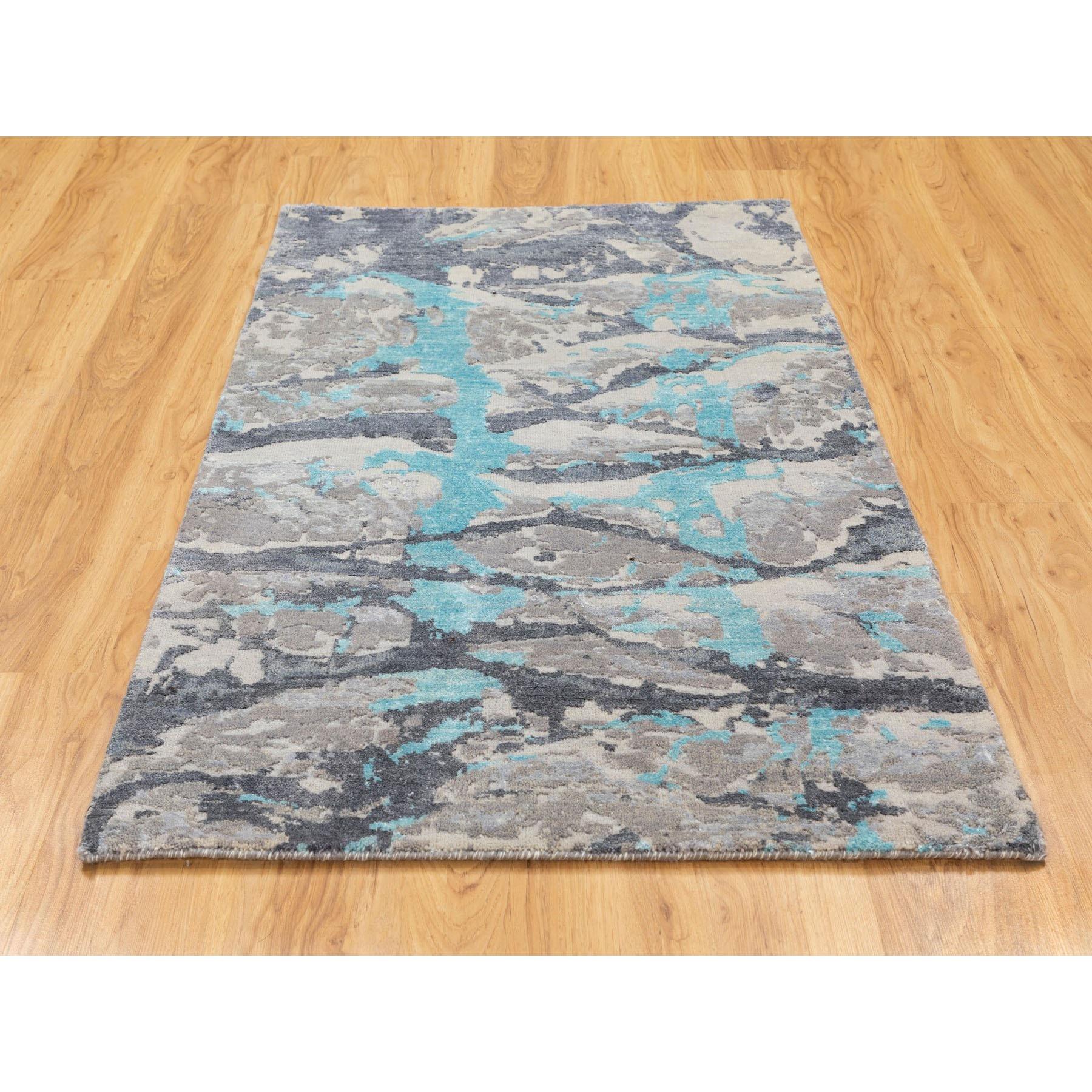 This is a truly genuine one-of-a-kind Aquamarine Modern Design Wool And Silk Hand Knotted Oriental Rug. It has been Knotted for months and months in the centuries-old Persian weaving craftsmanship techniques by expert artisans.
Primary materials: