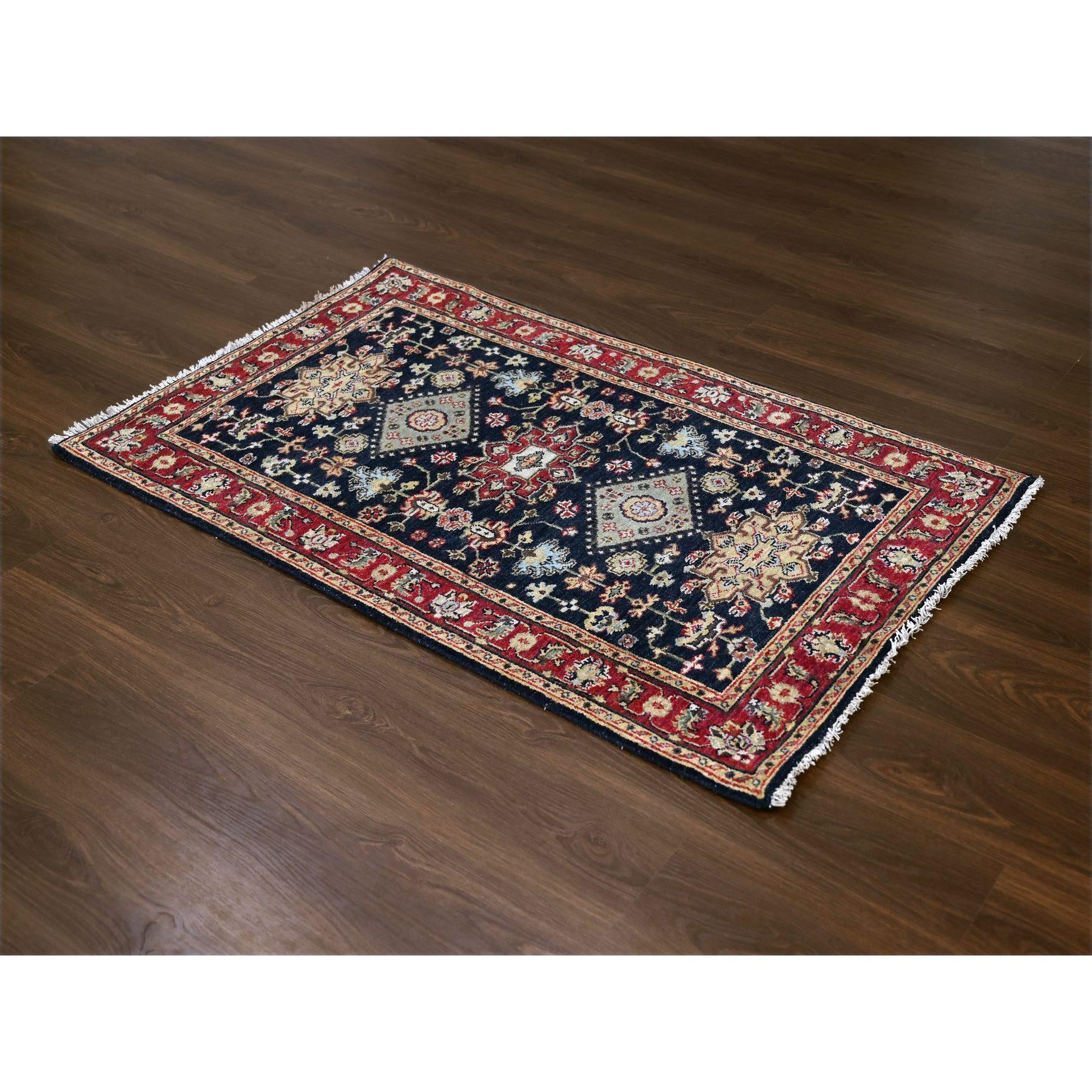 Denim Black, Karajeh Design with All Over Pattern, Vegetable Dyes, Soft Pile, Natural Wool, Hand Knotted, Oriental Rug
Primary materials: Wool
Latex: No Pile 
height: 0.25 Inches
Style: Traditional
Primary color: Black
Secondary colors: Cream Color,