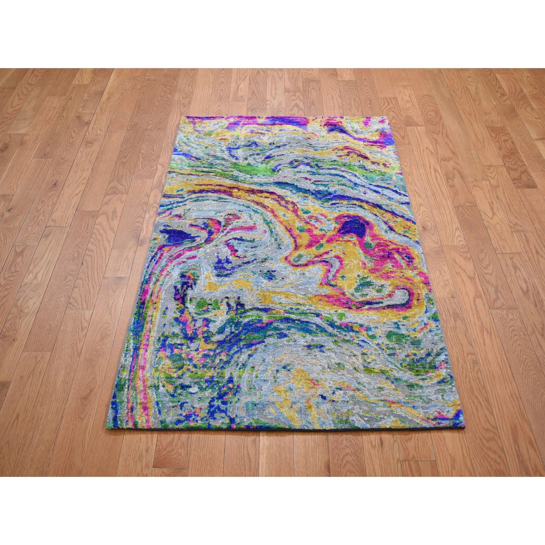This is a truly genuine one-of-a-kind THE LAVA, Colorful Sari Silk With Textured Wool Hand Knotted Rug. It has been Knotted for months and months in the centuries-old Persian weaving craftsmanship techniques by expert artisans.
Primary materials: