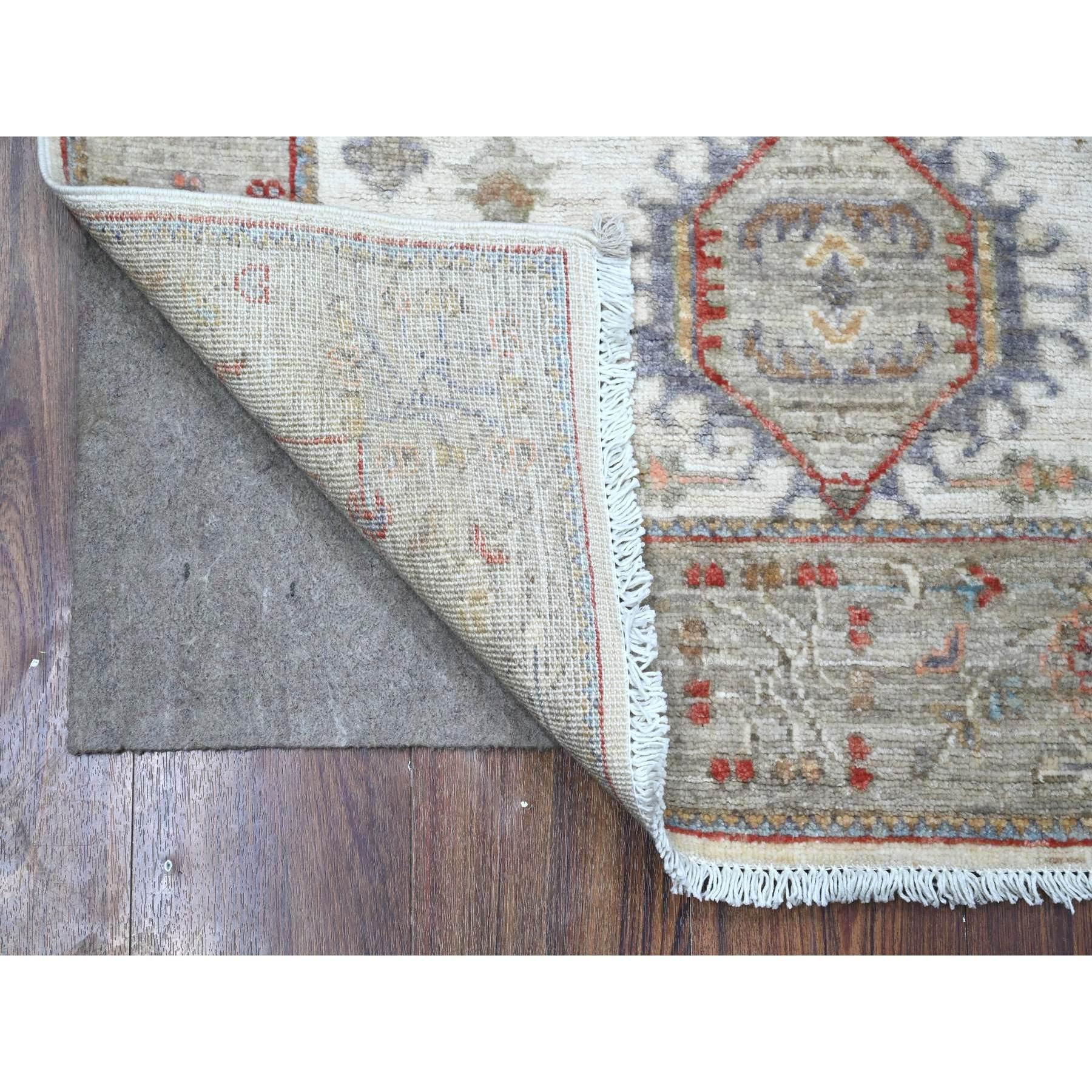 This is a truly genuine one-of-a-kind Karajeh Design, Hand Knotted, Pure Wool, Oriental Rug. It has been Knotted for months and months in the centuries-old weaving craftsmanship techniques by expert artisans
Primary materials: Wool
Latex: No Pile