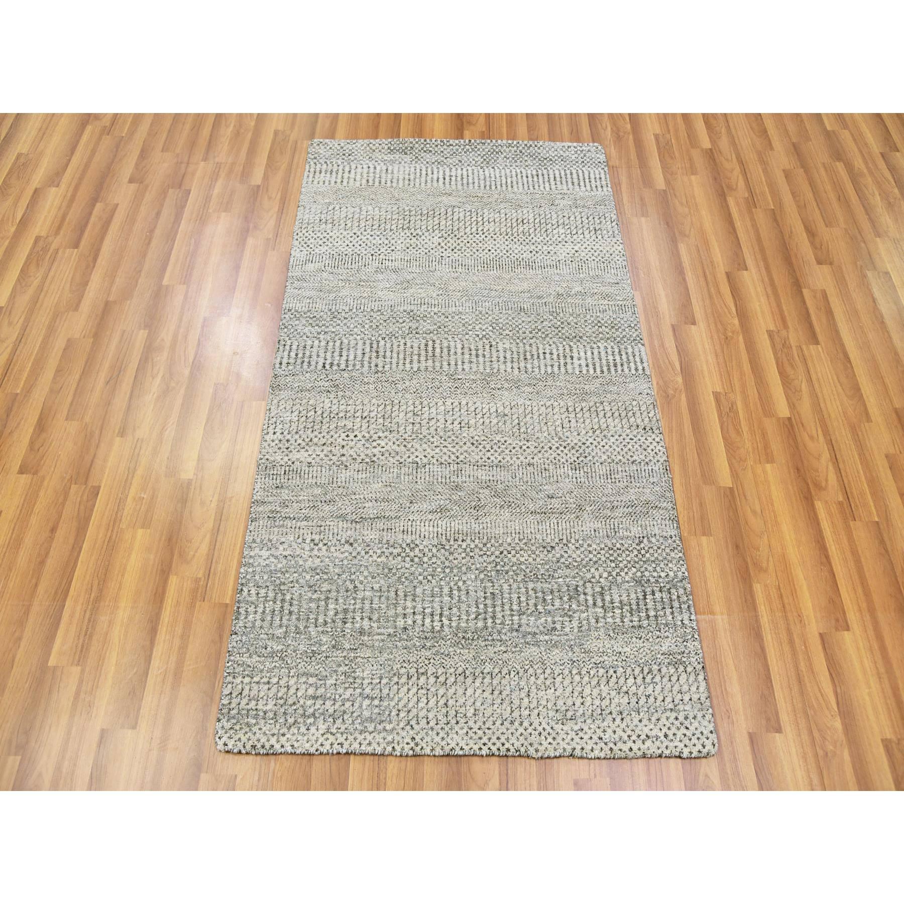 This is a truly genuine one-of-a-kind Undyed Pure Wool, Tone on Tone, Modern Grass Design, Hand Knotted, Oriental Rug. It has been Knotted for months and months in the centuries-old weaving craftsmanship techniques by artisans.
Primary materials: