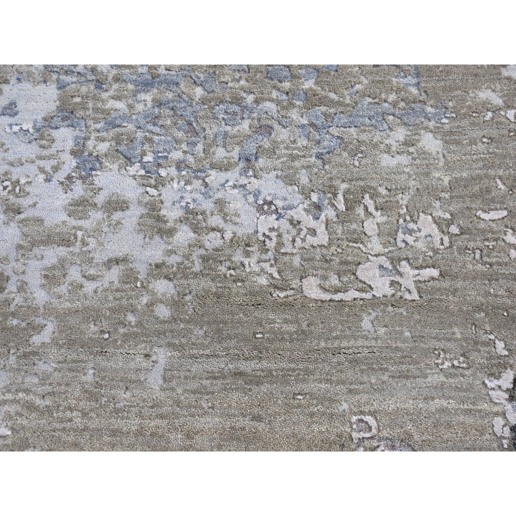 This is a truly genuine one-of-a-kind Abstract Design Wool and Silk Hi-Low Pile Gray Denser Weave Hand Knotted Scatter Size Oriental Rug. It has been woven for months and months in the centuries-old Persian weaving craftsmanship techniques by expert