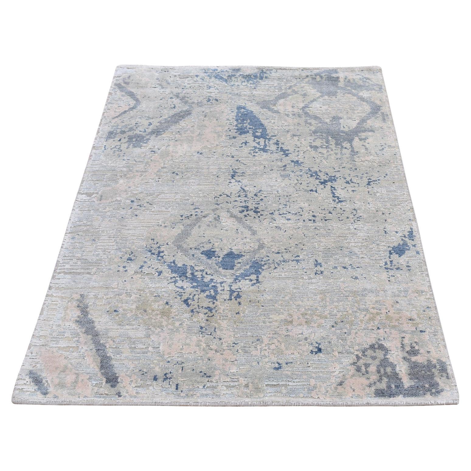 Tappeto 3
x5
5" Ivory Large Elements with Pastels Modern Silk with Textured Wool