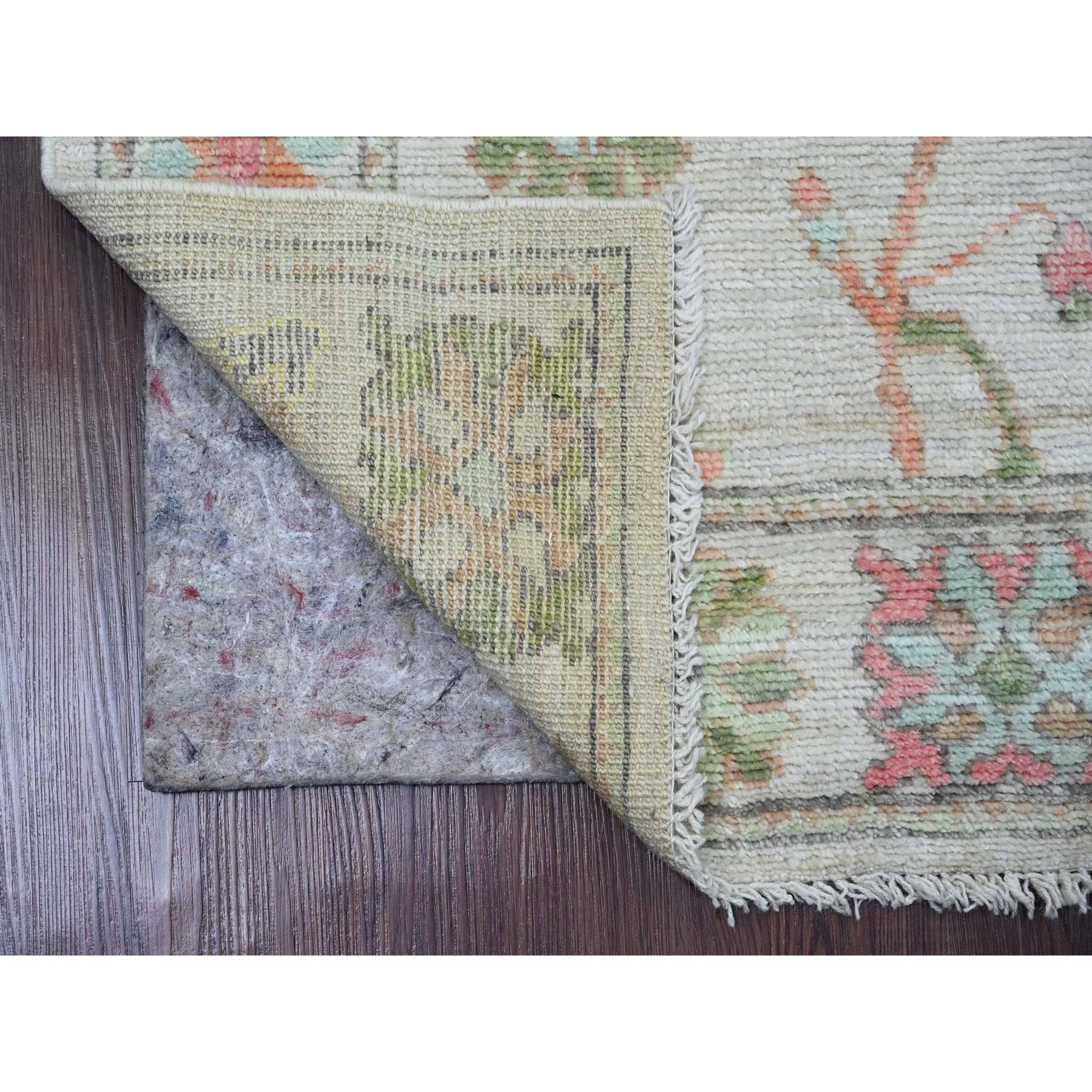 Cotton White, Afghan Angora Oushak with Colorful Leaf Design, Veggie Dyes, Hand Knotted, Pure Wool, Runner, Oriental Rug
Primary materials: Wool
Latex: No Pile 
height: 0.25 Inches
Style: Transitional
Primary color: Ivory
Secondary colors: Red,