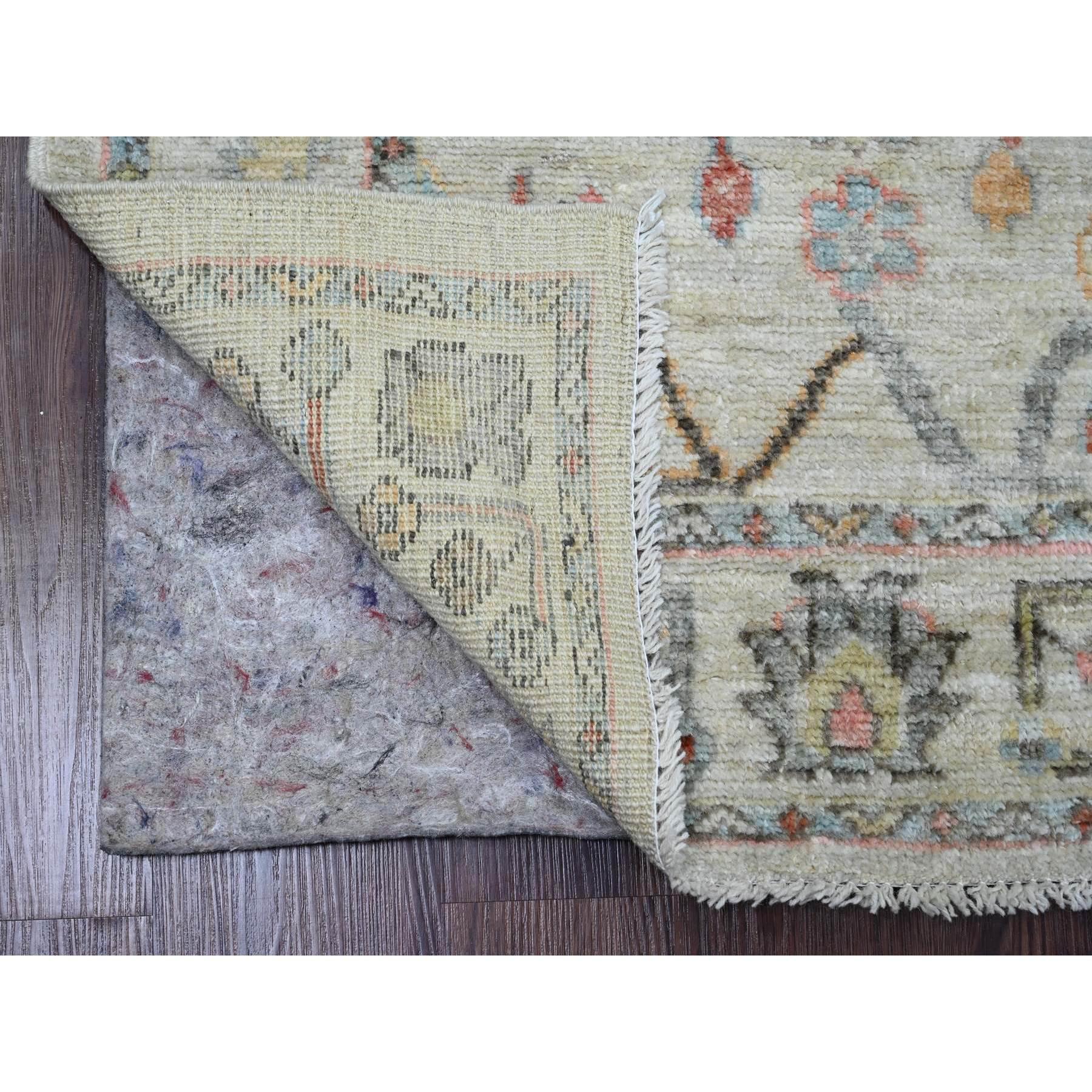 Seashell White, Hand Knotted, Afghan Angora Oushak with Colorful Leaf Design, Vegetable Dyes, Pure Wool, Runner, Oriental Rug
Primary materials: Wool
Latex: No Pile 
height: 0.25 Inches
Style: Transitional
Primary color: Ivory
Secondary colors: