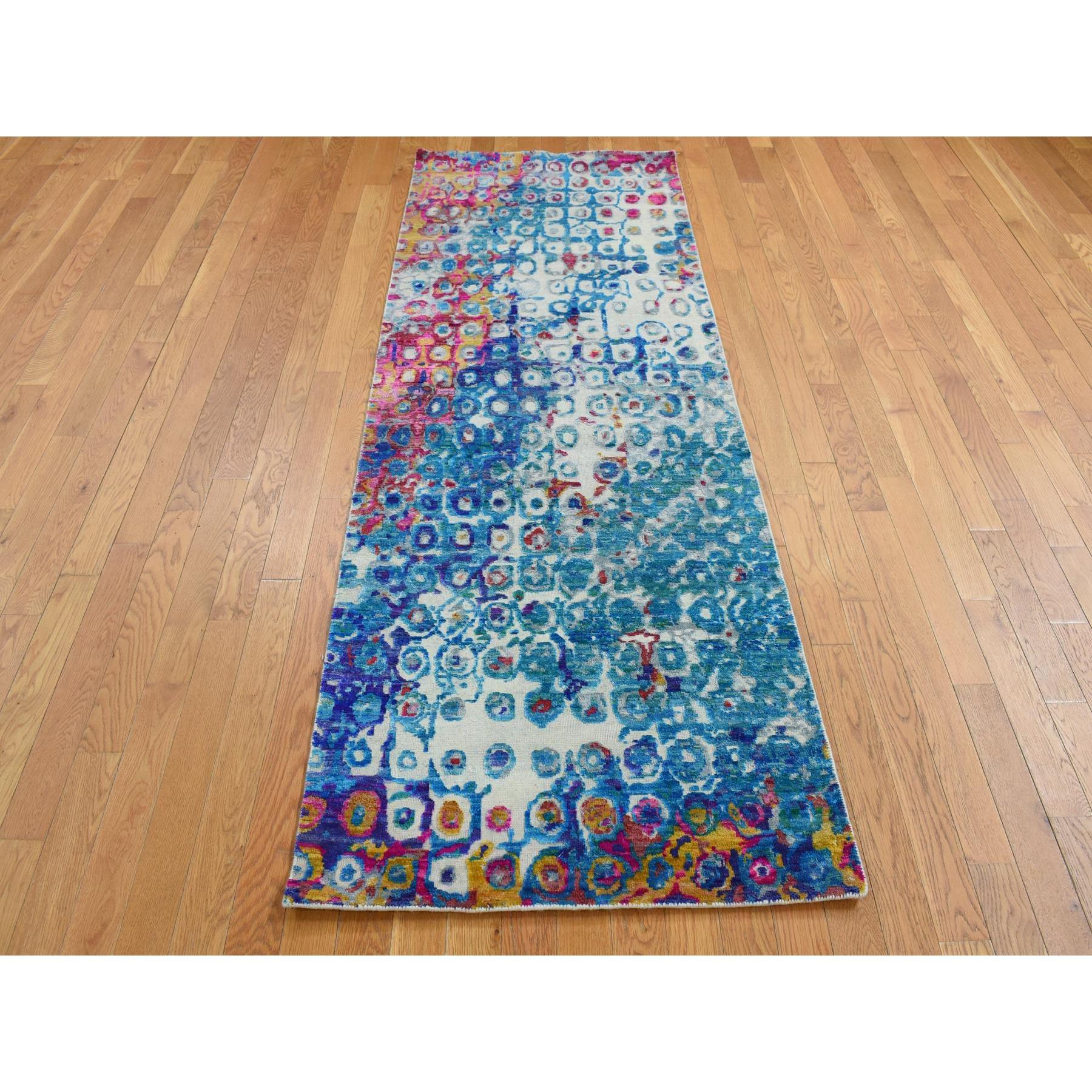 Admiral Blue, THE PEACOCK, Sari Silk, Colorful, Hand Knotted, Wide Runner, Oriental Rug
Primary materials: Sari Silk
Latex: No Pile 
height: 0.25 Inches
Style: Transitional
Primary color: Blue
Secondary colors: Violet, Purple, Pink, Red, Ivory,