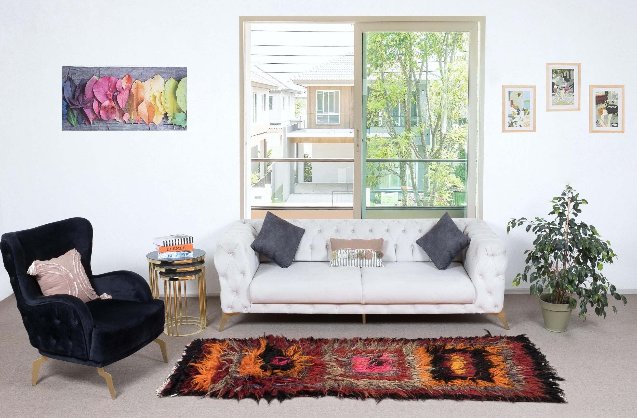 A vintage hand-knotted shag pile rug made of mohair derived from local “Angora Goats” that are famous for their soft, lustrous long fleece. A true testament to Anatolian craftsmanship, this rug brings together the softness of mohair and the