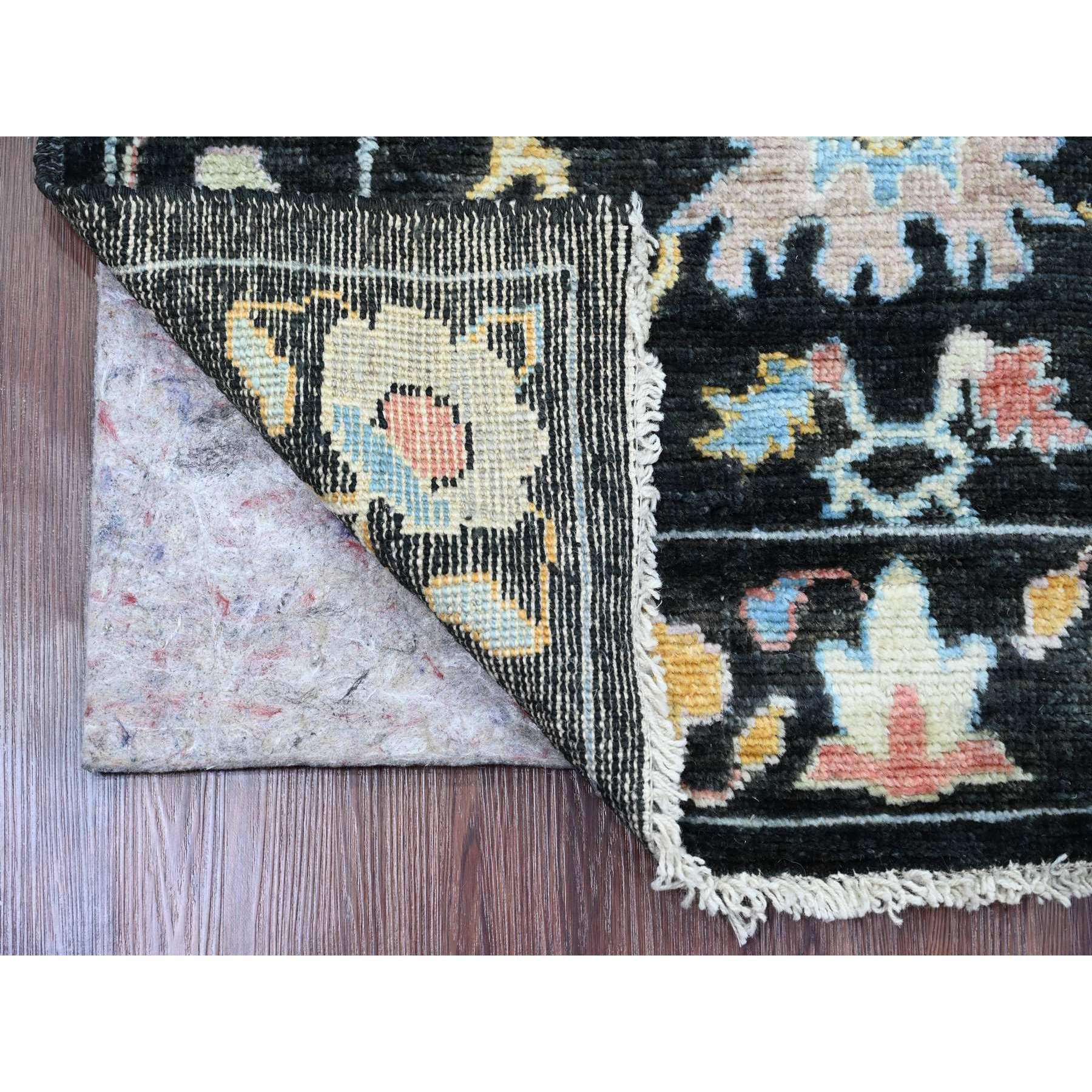 Ink Black, Afghan Angora Oushak with Pop of Color, Leaf Design, Hand Knotted, Vegetable Dyes, 100% Wool, Runner, Oriental Rug
Primary materials: Wool
Latex: No Pile 
height: 0.25 Inches
Style: Transitional
Primary color: Black
Secondary colors: Red,