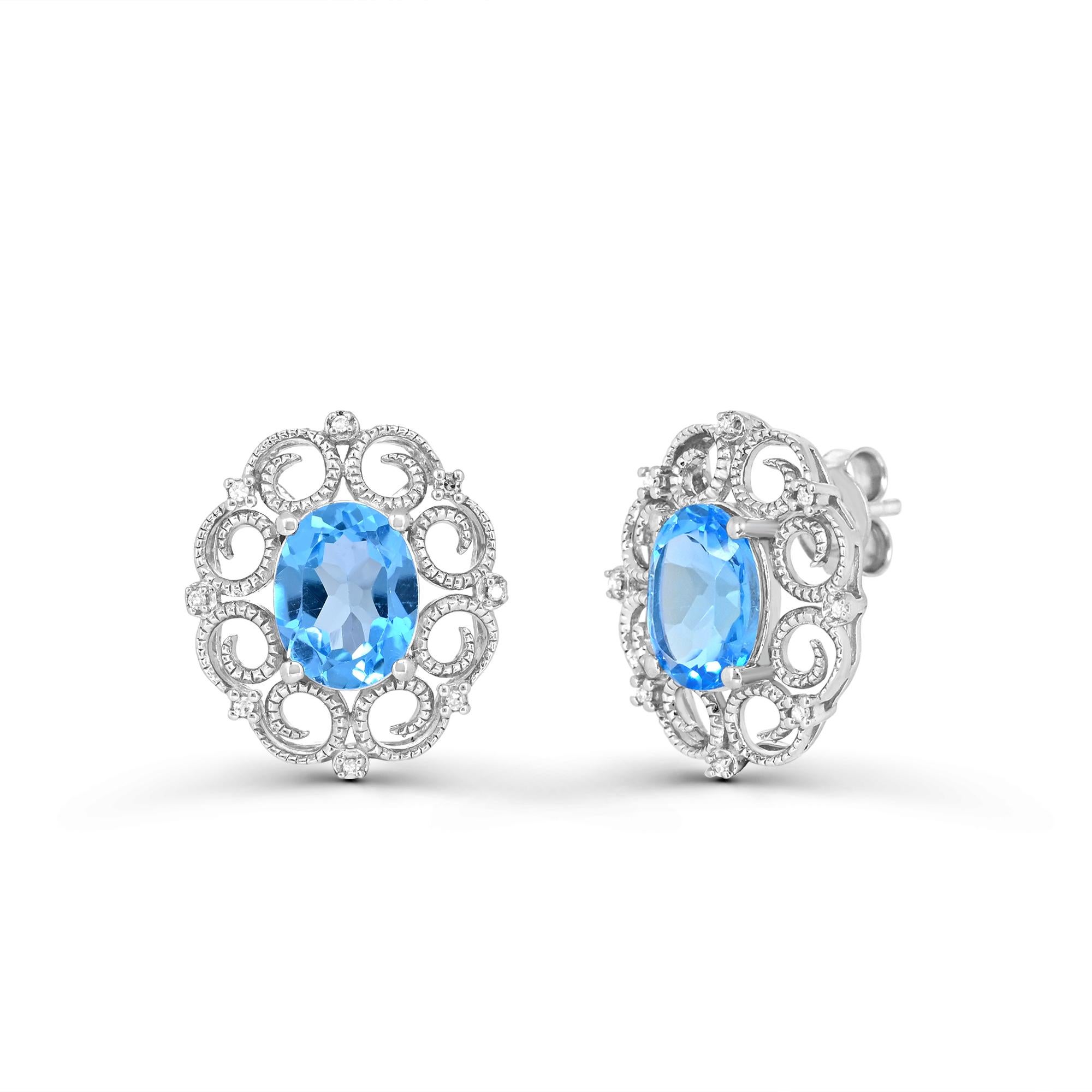 Indulge in elegance with our 4-1/2 Carat Swiss Blue Topaz and White Diamond Stud Earrings. Crafted with sterling silver patterns, each earring features a stunning oval Swiss blue topaz accented by round single-cut diamonds. With push-back post