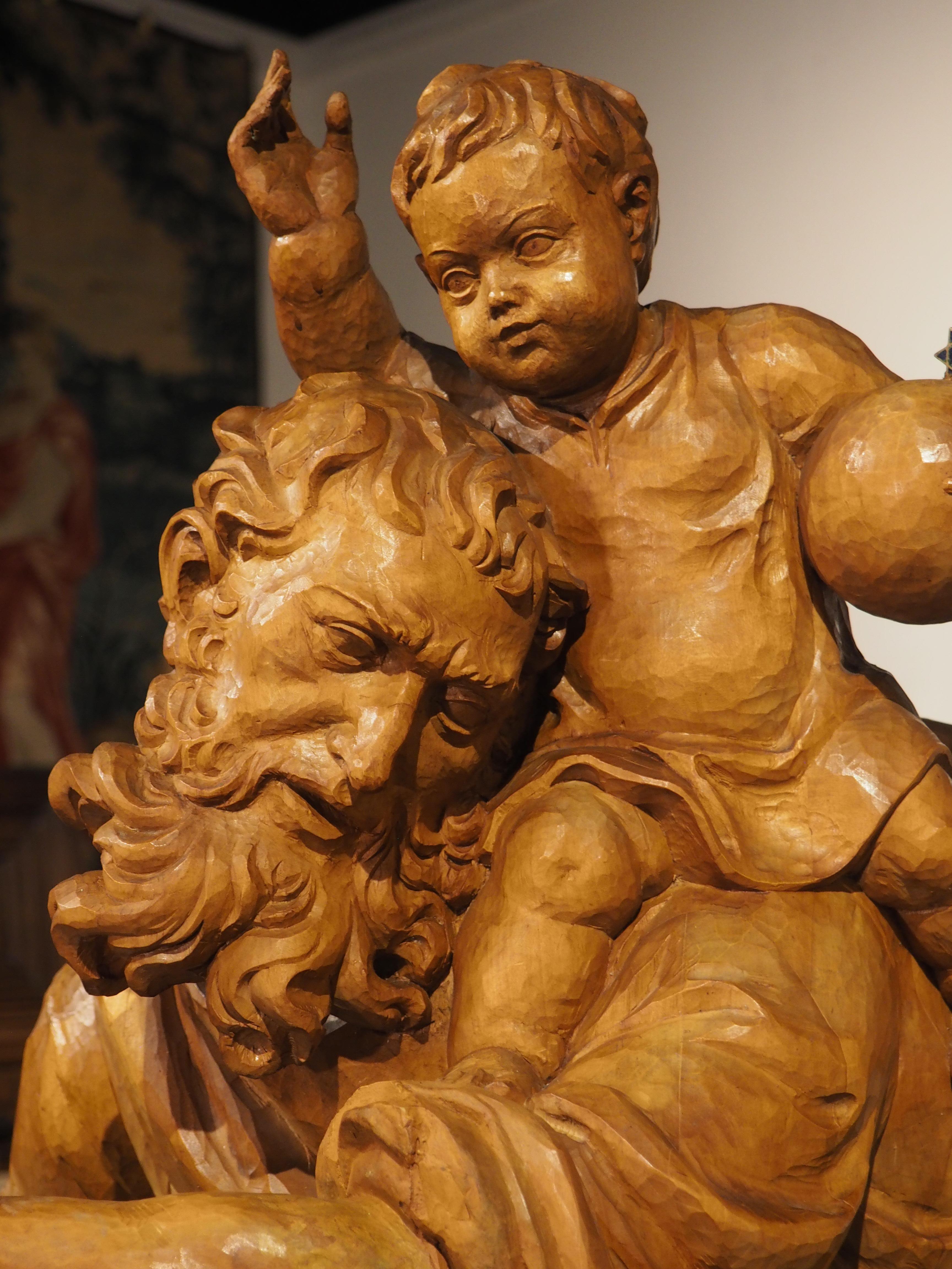 Hand-Carved Solid Limewood Statue of St. Christopher, Germany, circa 1930 For Sale