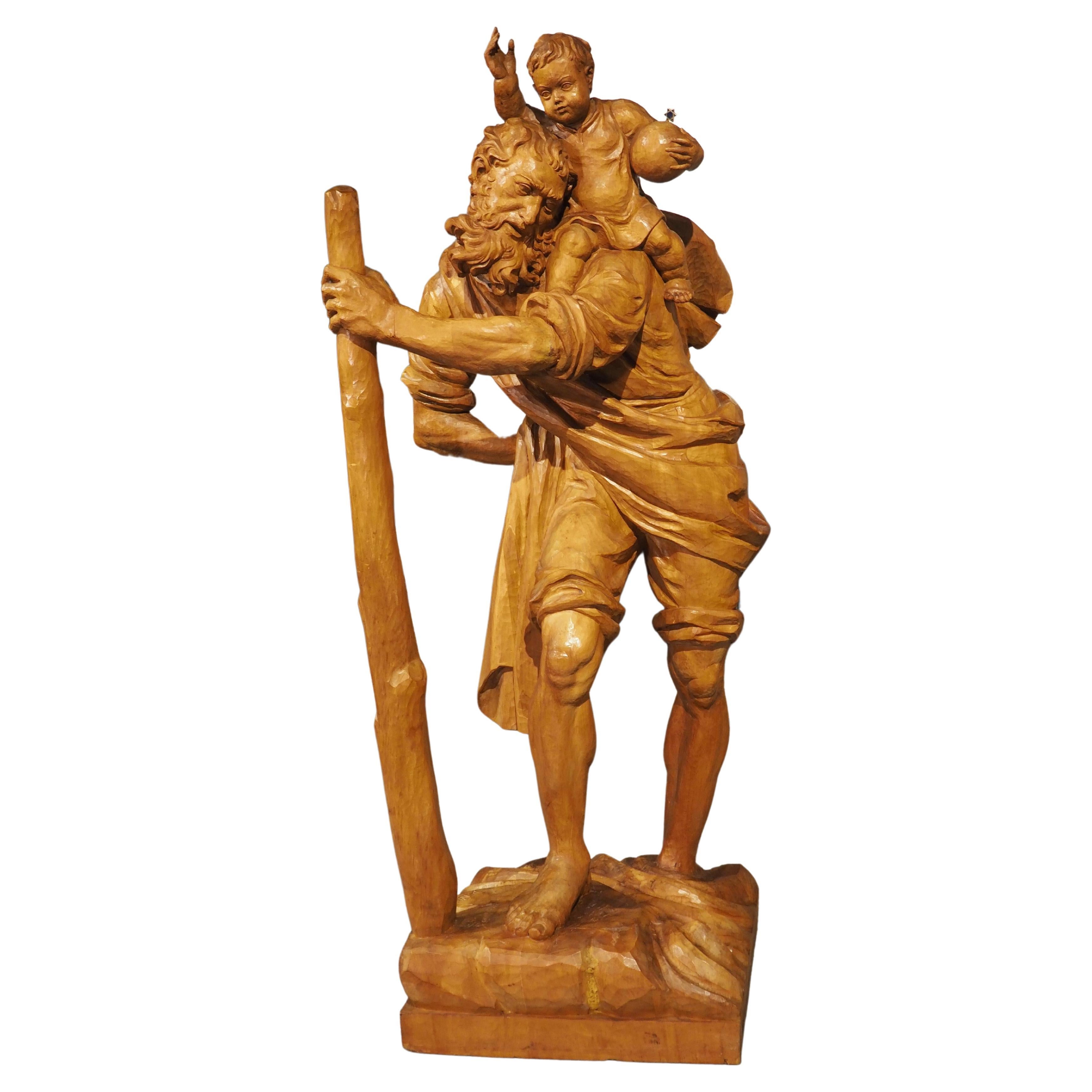 Solid Limewood Statue of St. Christopher, Germany, circa 1930 For Sale
