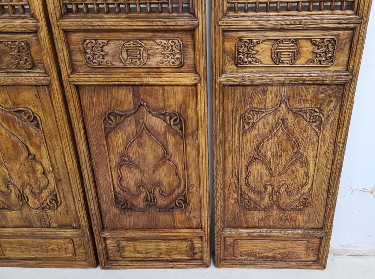 Offering one of our recent palm beach estate fine furniture acquisitions of 
A set of 4 19th century Chinese open fretwork Panels doors screens wall decor
They have been fitted with wall hangers at the top backs so they are ready to hang.

Photo