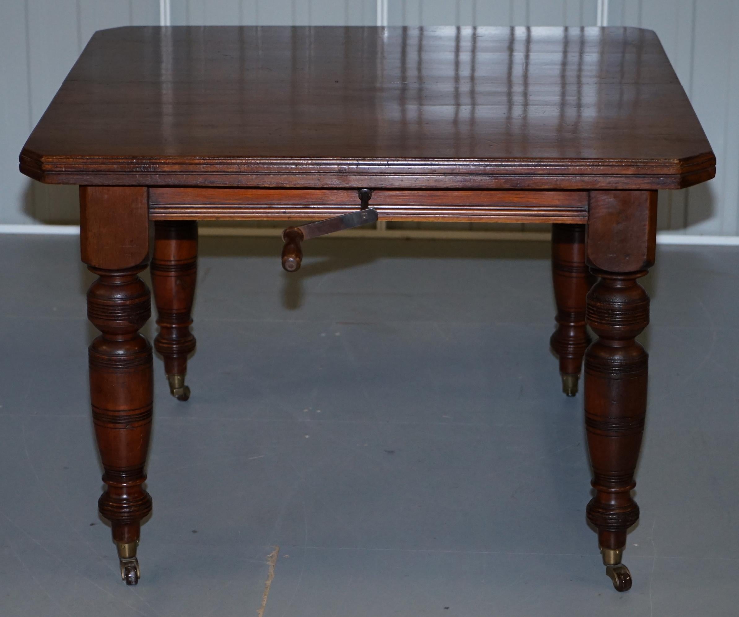 4-6 Person Victorian Mahogany Wind Out Dining Table with Porcelain Castors 9