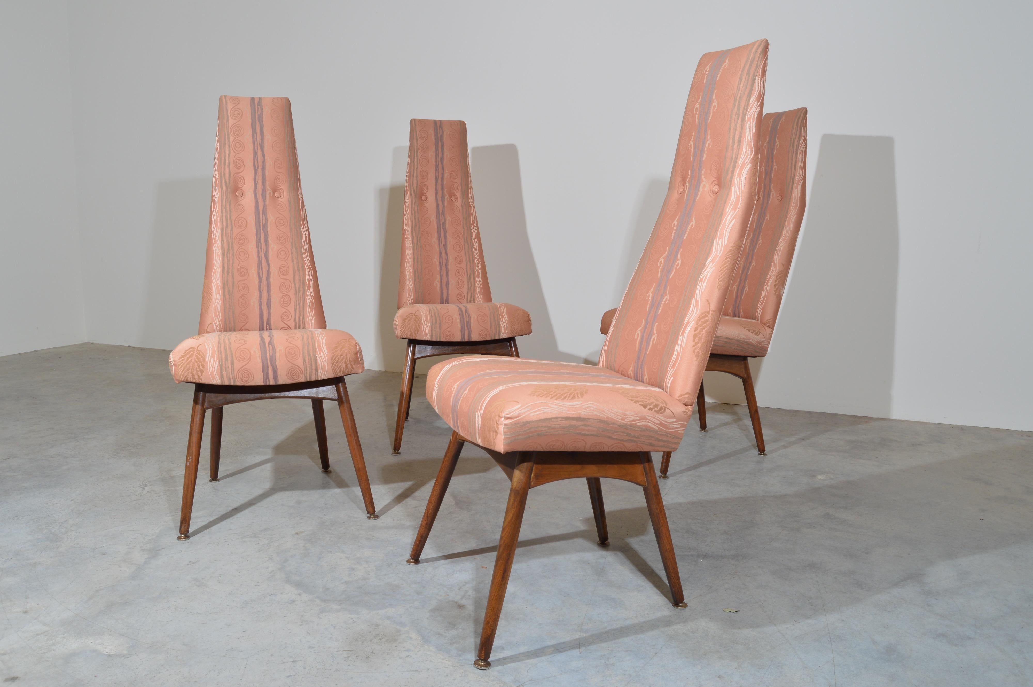A set of 4 original Adrian Pearsall dining chairs having highback seats over walnut frames circa 1960. 
 Chairs are in good, solid condition and are ready for use.