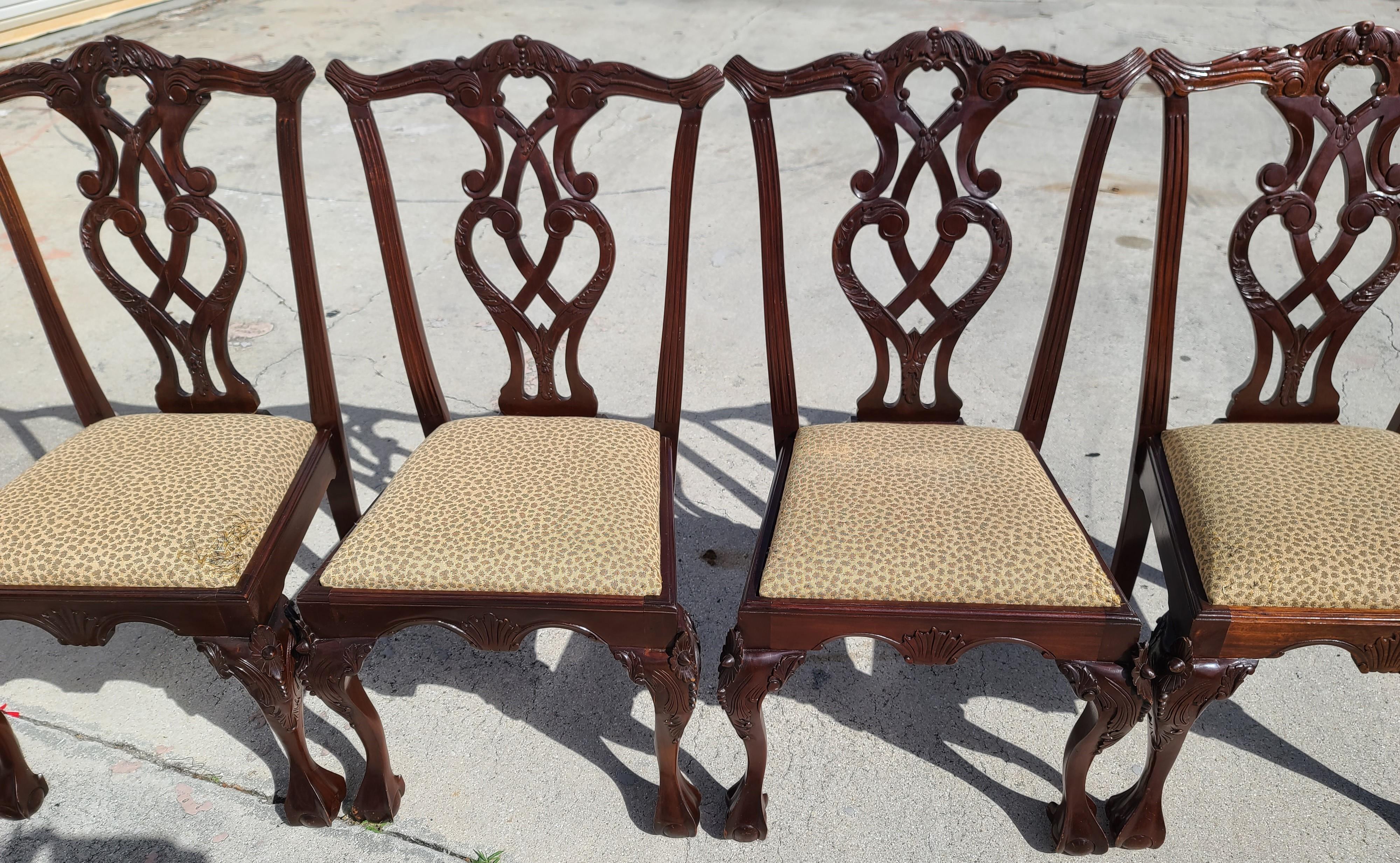 Offering One Of Our Recent Palm Beach Estate Fine Furniture Acquisitions Of A
Set of (4) Antique Chippendale Carved Mahogany Owl Eyes Ball & Claw Feet Side Dining Chairs 

Approximate Measurements in Inches
40