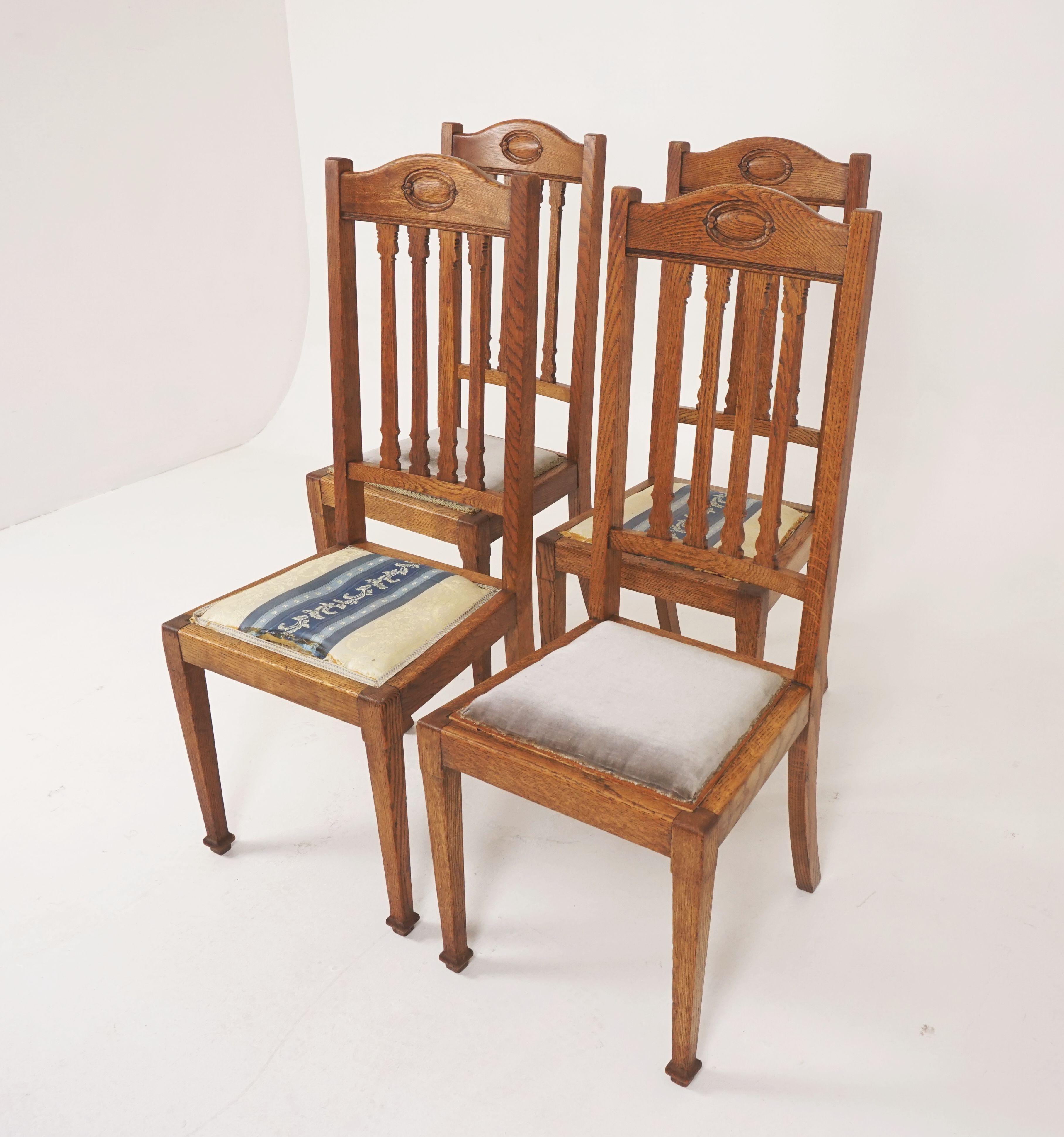 4 antique dining chairs, oak Arts & Crafts Chairs, Scotland 1910, H166

Scotland, 1910
Solid oak
Original finish
Arched top rail with incised roundels
Four shaped vertical splats underneath
Padded seats
All standing on square tapering legs with