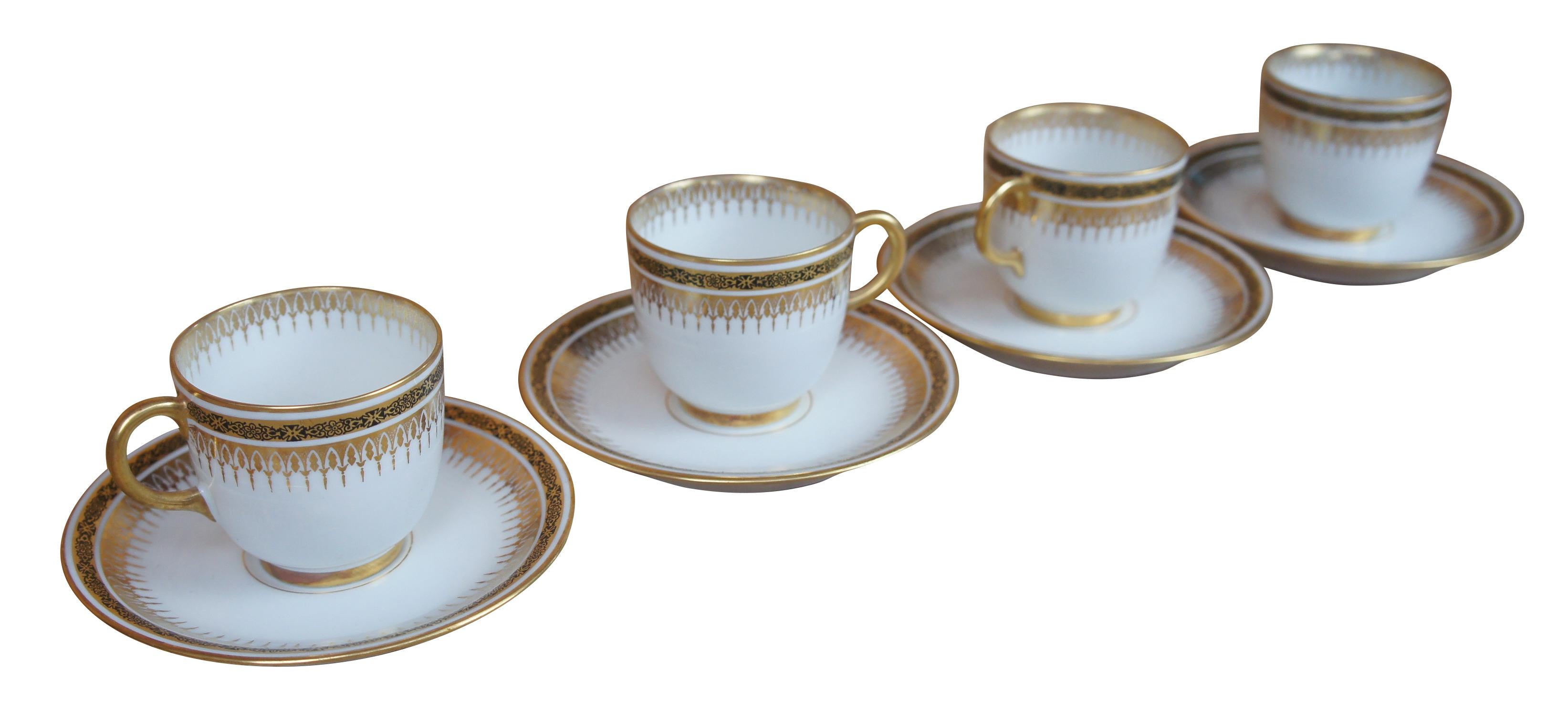 Antique eight piece set of Jean Pouyat demitasse tea / coffee / chocolate limoges china featuring an ivory, gold and black pattern. Paris France.

saucers 4- 4.5