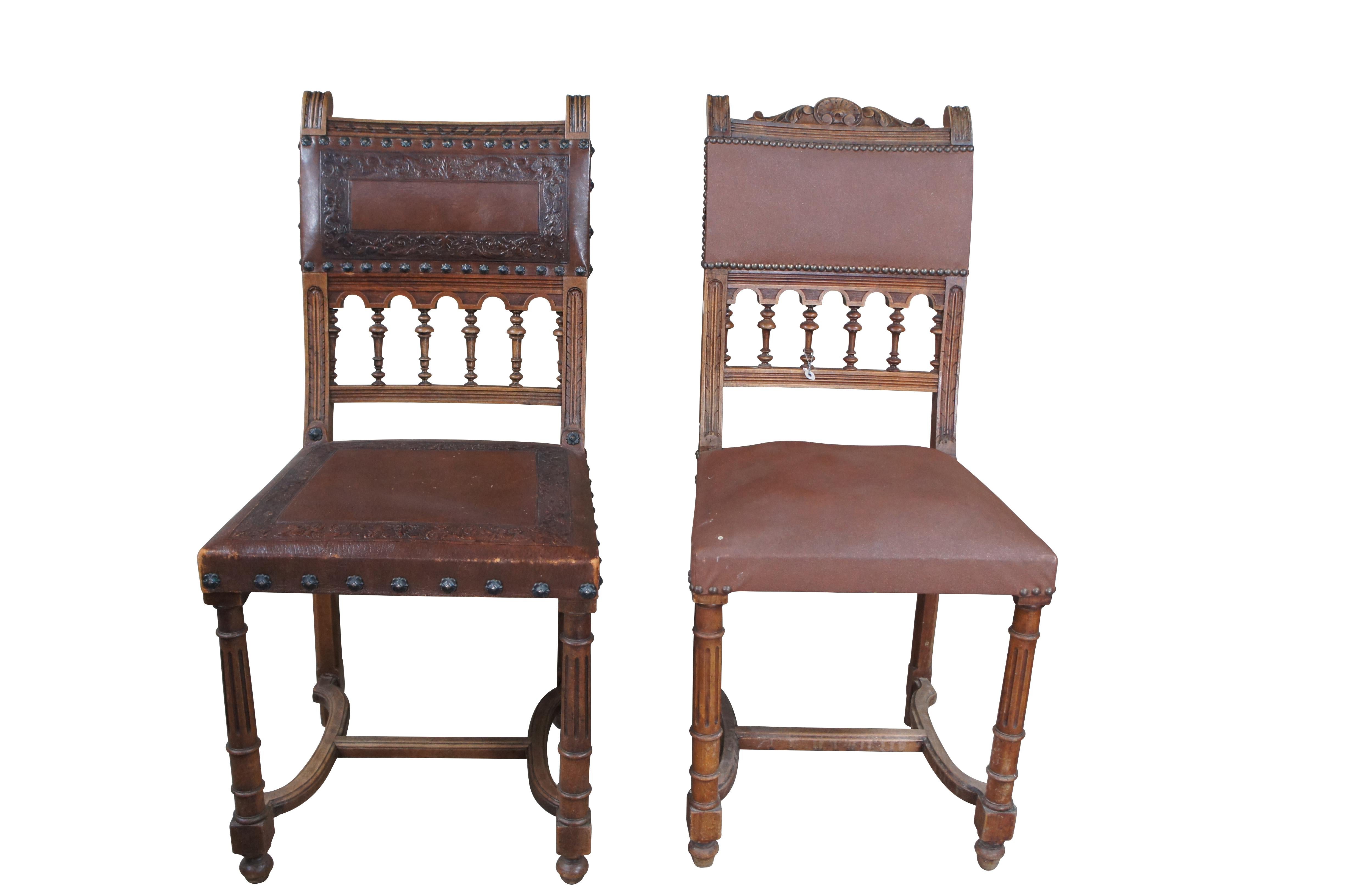 Lot of four Henry II style dining chairs. Features a hardwood construction with carved and molded spindle backs. The chairs are supported by fluted legs with H stretchers and bun feet. Upholstered in leather with some tooling and nailhead