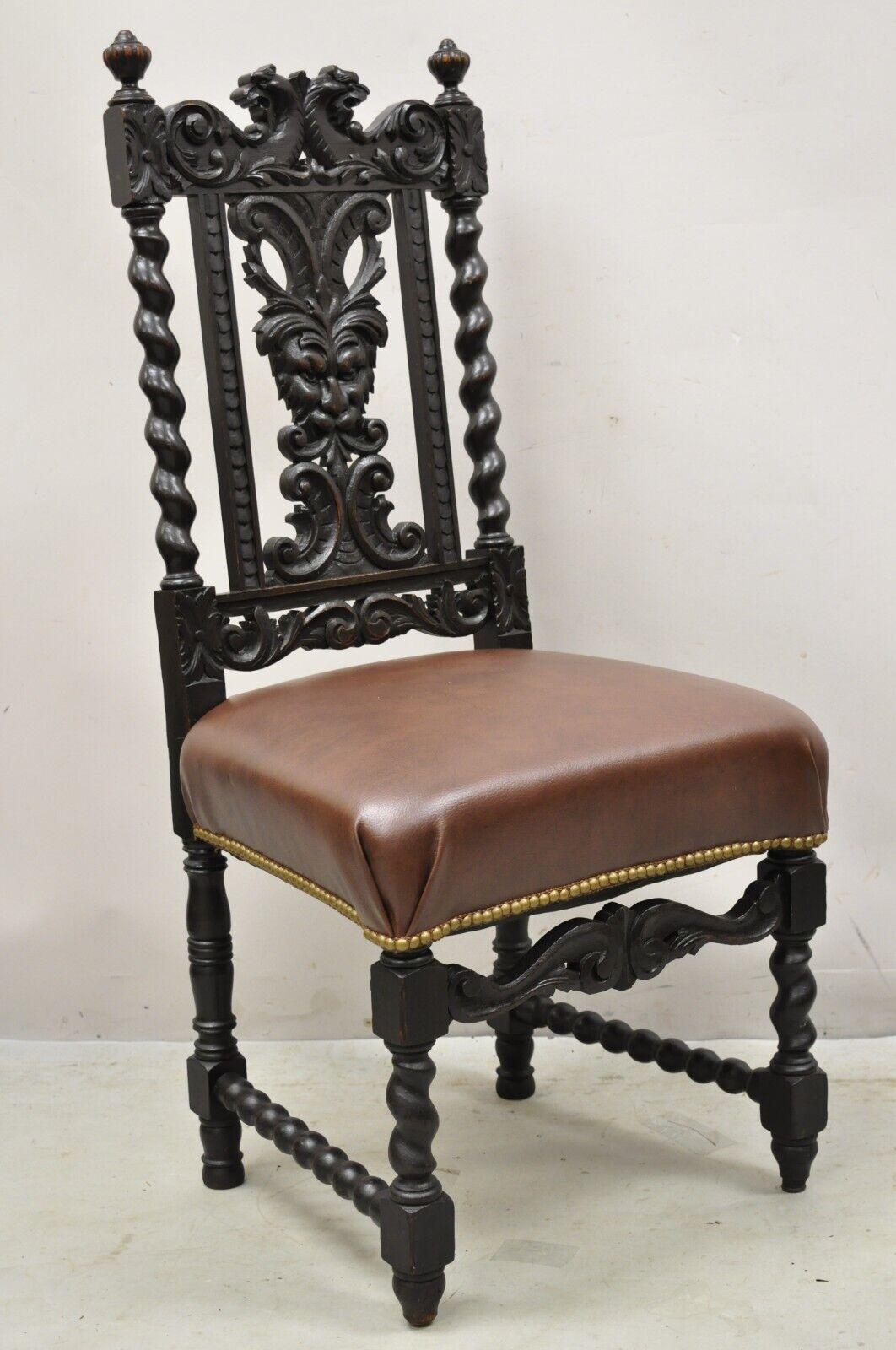 4 Antique Italian Renaissance revival Gothic carved oak figural dining chairs. Item features (4) side chairs, brown leather seats, spiral carved front, lion carved crest, northwind face to center of backsplat. circa 19th century. Measurements: 44.5