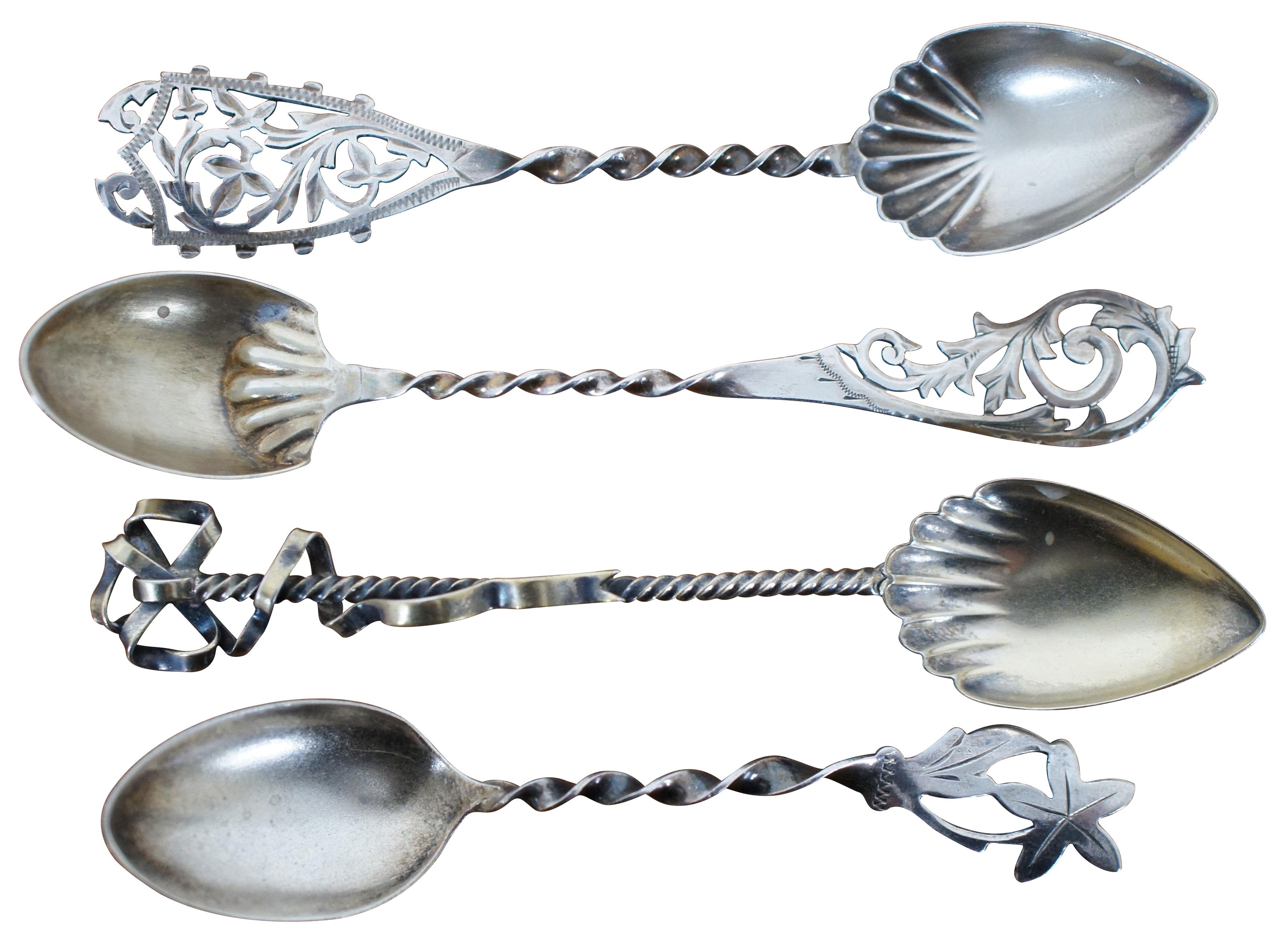 Lot of 4 antique sterling silver coffee / sugar spoons with scallop shell design on the bowls, twisted handles, and pierced / reticulated handles. One by Campbell-Metcalf Silver Co.

Approx - 4” x 0.875” (Length x Width) / Combined Weight - 25.5 g.