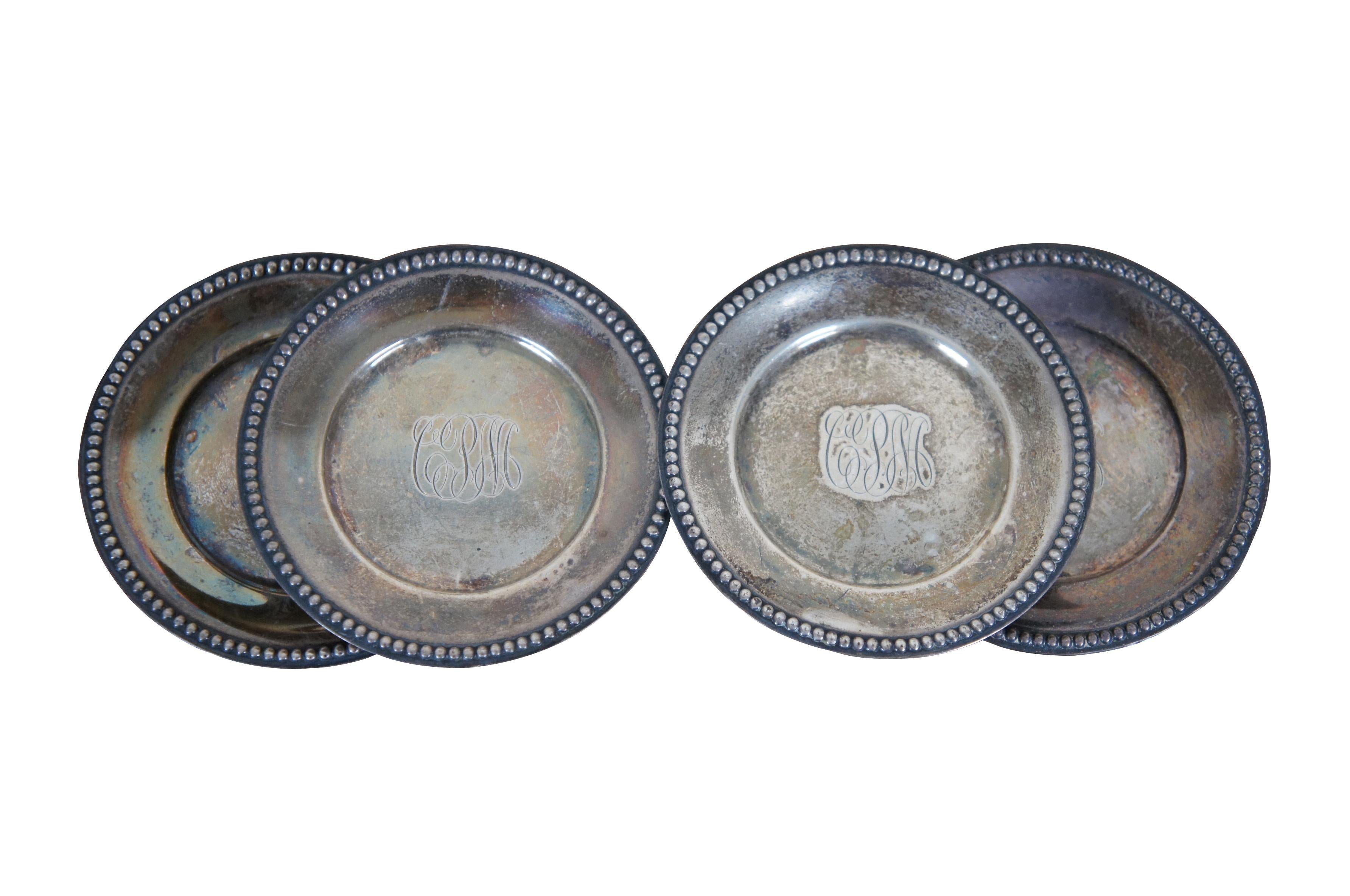 Ensemble de quatre plats à os/noix anciens en argent sterling de Whiting Manufacturing Co avec bord perlé, numéro d'article 5240. Monogrammé avec les initiales CPM.

