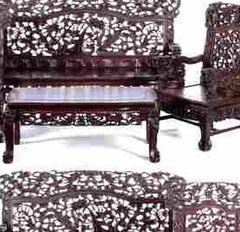 4 armchairs; 2 sofas and 2 tables; Chinese; in Noble Wood.