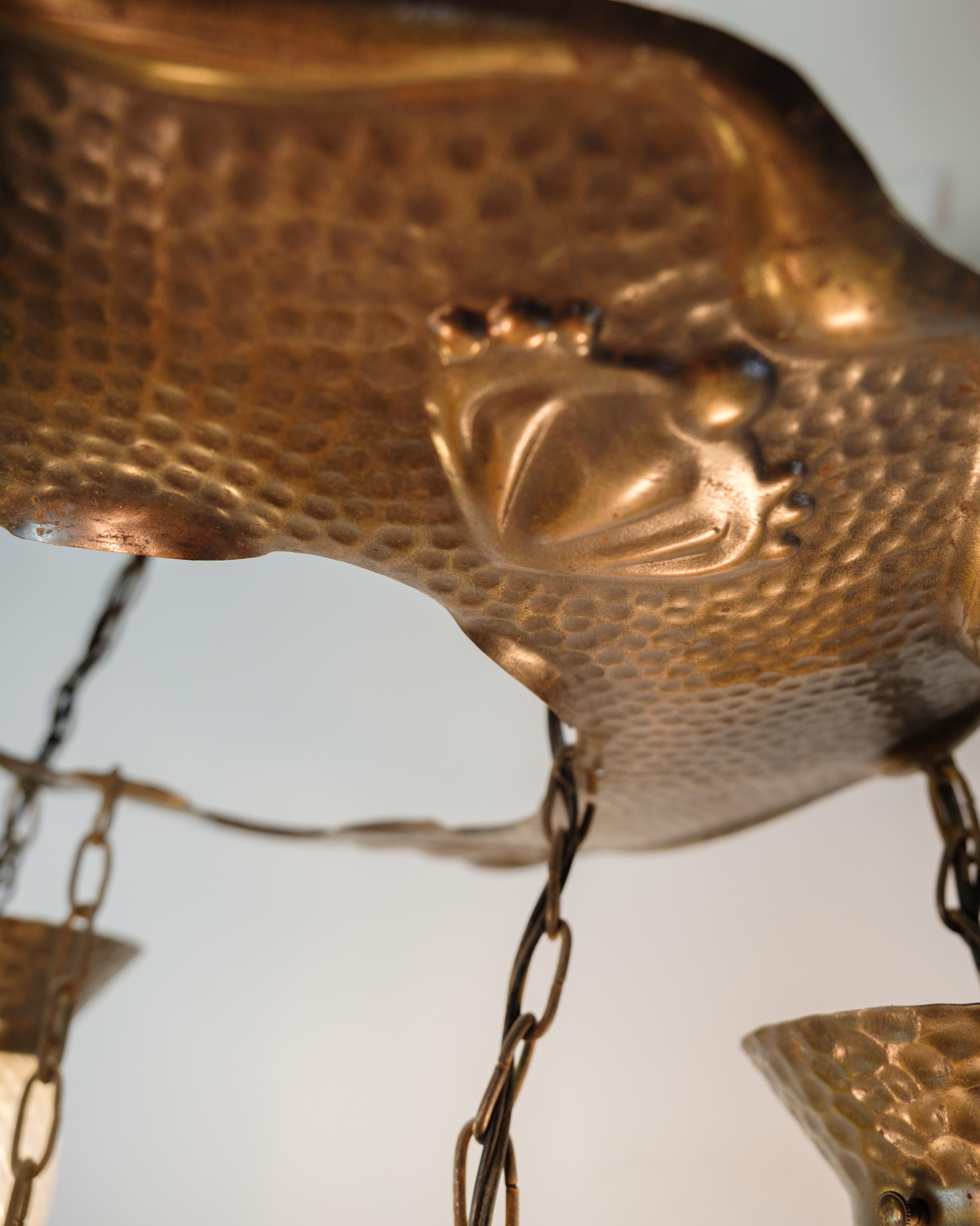 Danish 4 Armed Art Nouveau Chandelier In Patinated Hammered Brass & Teardrop Glass For Sale