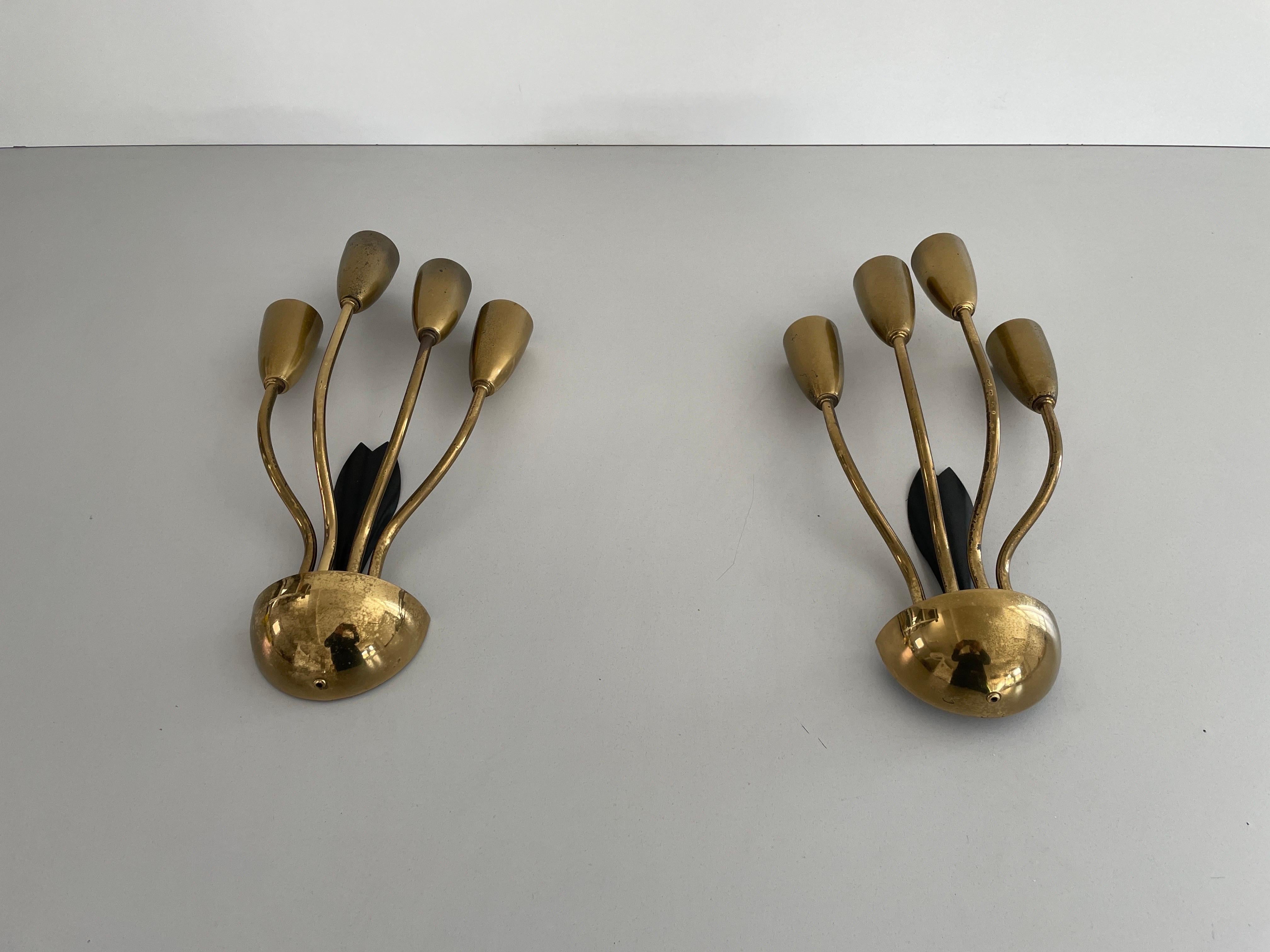 4-armed Flower Design Brass Sputnik Pair of Sconces, 1950s, Germany
Probably Manufactured for a cinema in around Berlin

Very elegant and Minimalist wall lamps
Lamp is in very good condition.

These lamps works with 4x E14 standard light bulbs.