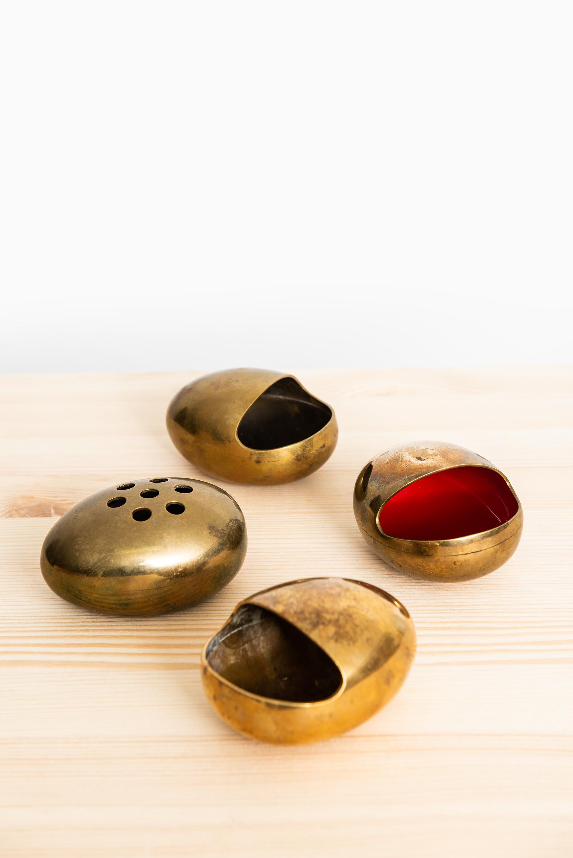 Set of 4 ashtrays in brass. Produced by Cohr in Denmark.