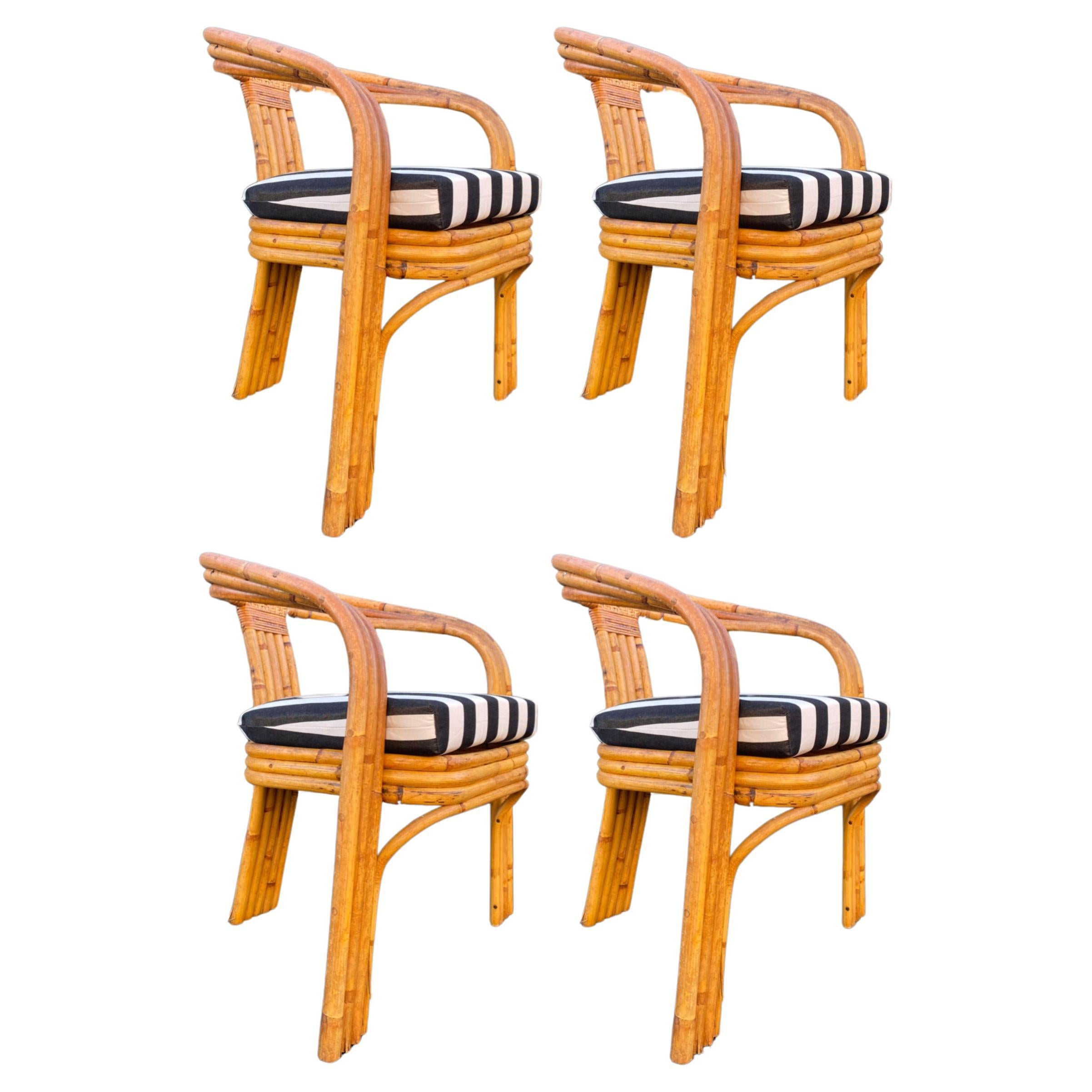 (4) Poltrone scultoree in rattan piegato in stile Axel Enthoven