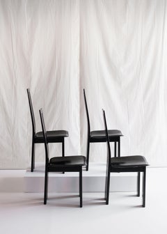4 black Dining chairs by Pietro Costantini for Ello, 1970s