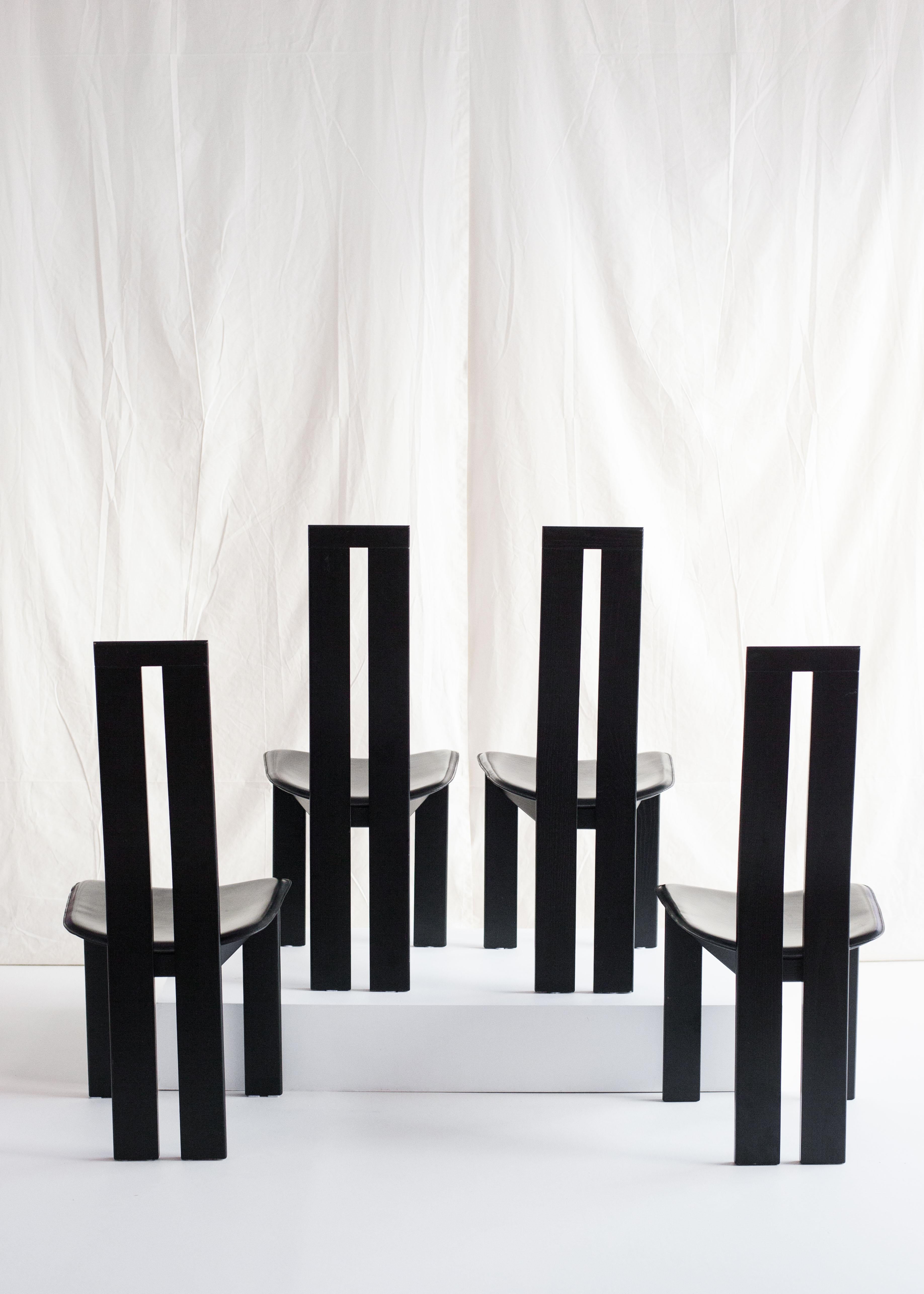 Italian 4 black Dining chairs by Pietro Costantini for Ello, 1970s For Sale