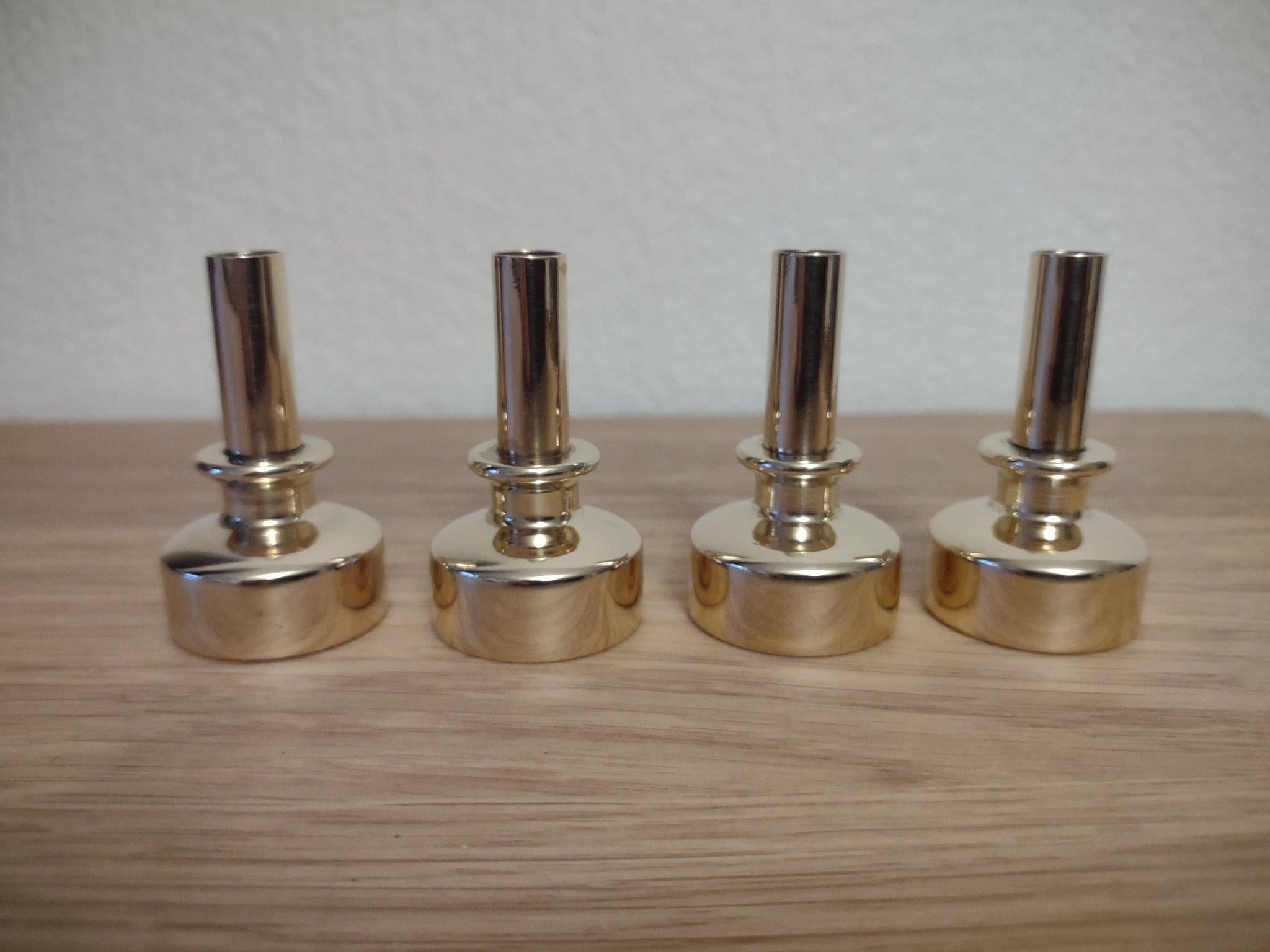 Set of 4 model L92 brass candlesticks by Hans Agne Jakobsson for Markaryd, Sweden, 1960s, in very good condition.