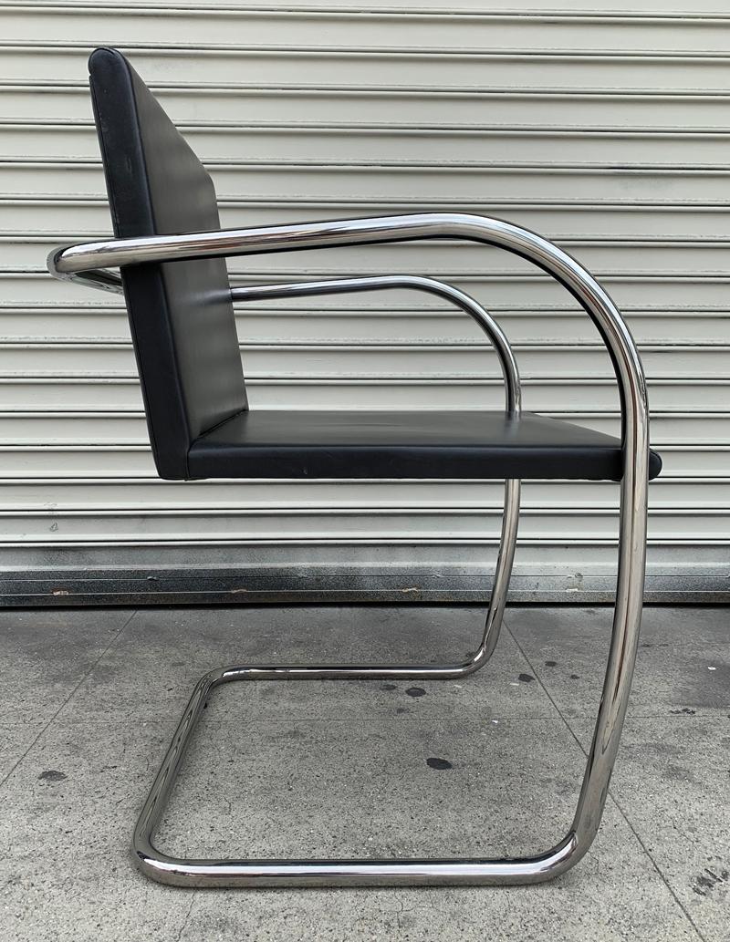 Set of 4 Brno chairs designed by Ludwig Mies van der Rohe for Knoll International.

The chairs have tubular frames and they are upholstered in cream colored leather which is in very good original condition.

The frames show oxidation and mild