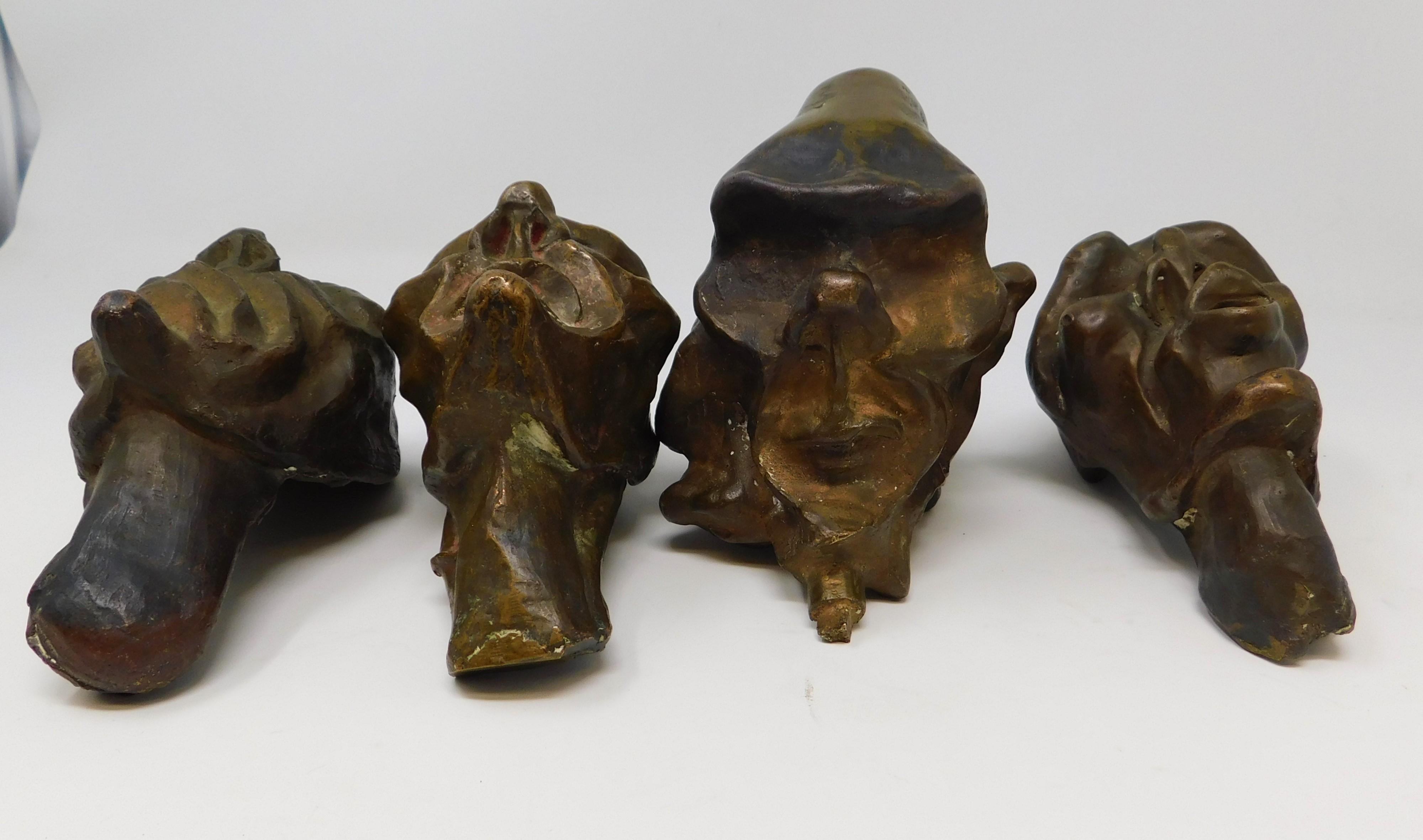 Canadien 4 Sculptures d'art figuratives à tête brutaliste en bronze, vers 1920 en vente