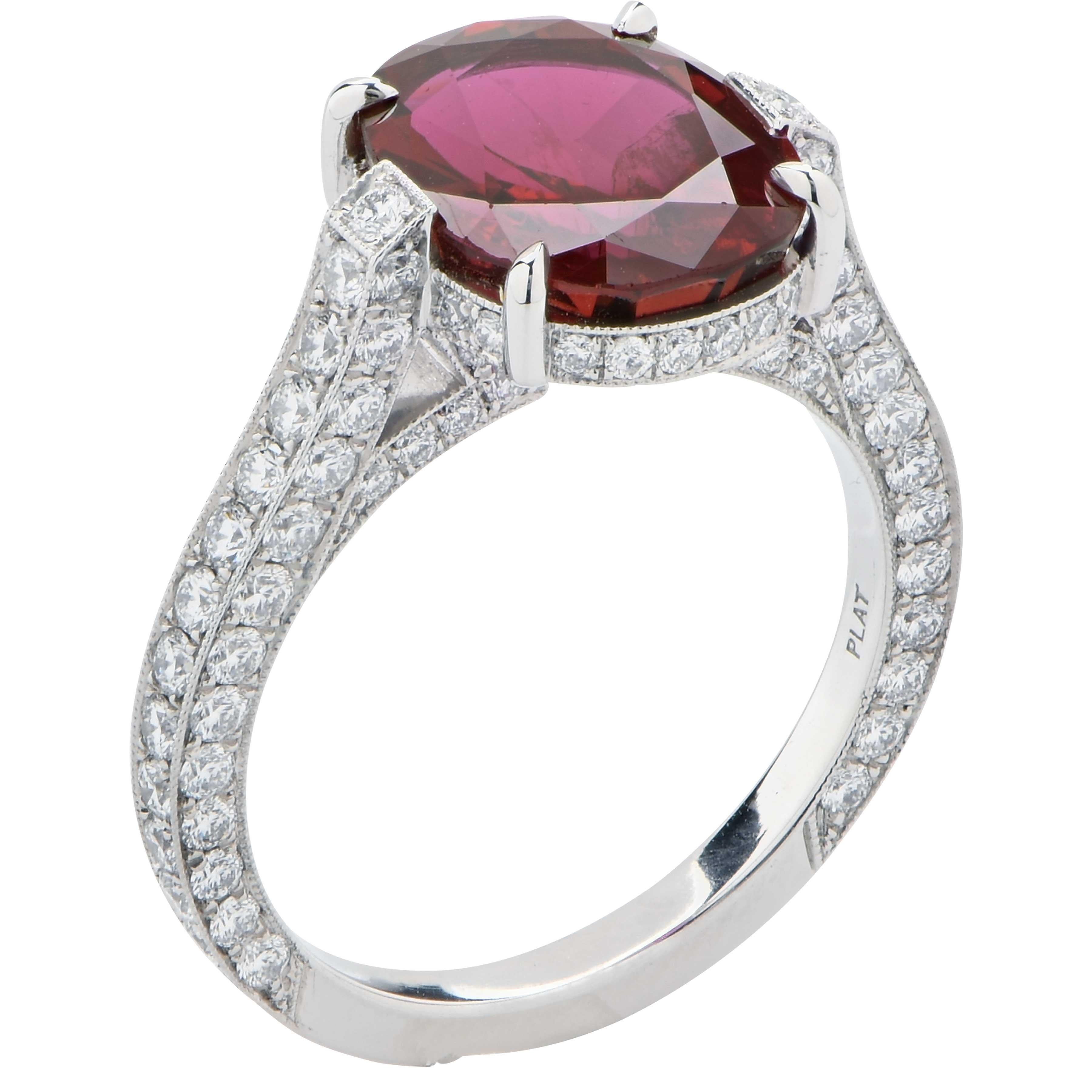 Ruby and Diamond ring featuring a 4.72 Oval Cut AGL Graded No Heat Ruby prong set in a platinum ring with 120 round brilliant cut diamonds weighing 1.40 carats.
Ring Size: 5 3/4 (Can be sized)
Metal: Platinum
Metal Weight: 6.5 Grams
