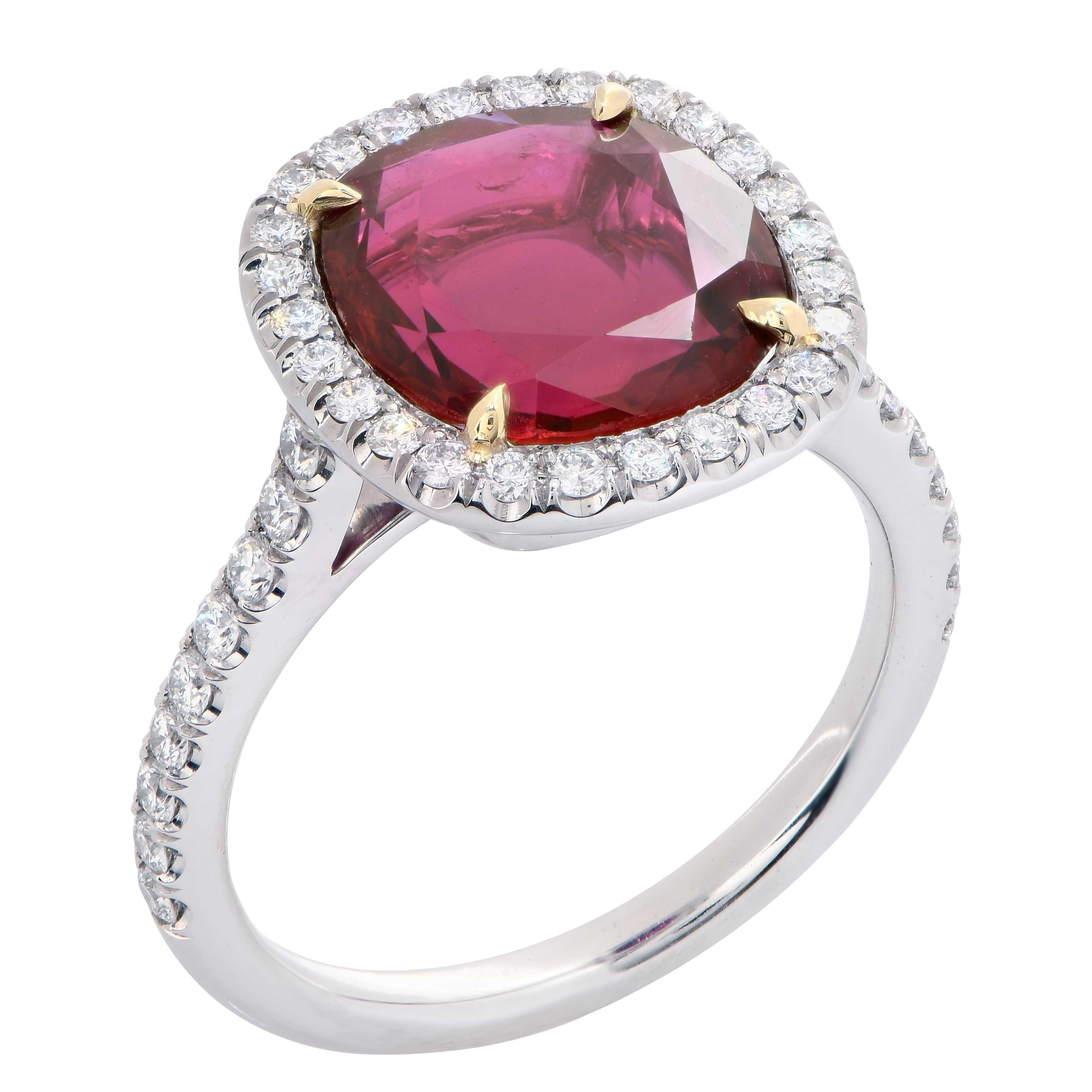 Ruby and diamond ring featuring a 4.04 carat AGL Graded  Cushion Cut Ruby prong set in a platinum ring with 44 round brilliant cut diamonds with a total weight of .46 Cts. 
Ring Size: 5.75 (can be sized)
Metal: Platinum
Metal Weight: 6.5 Grams
 