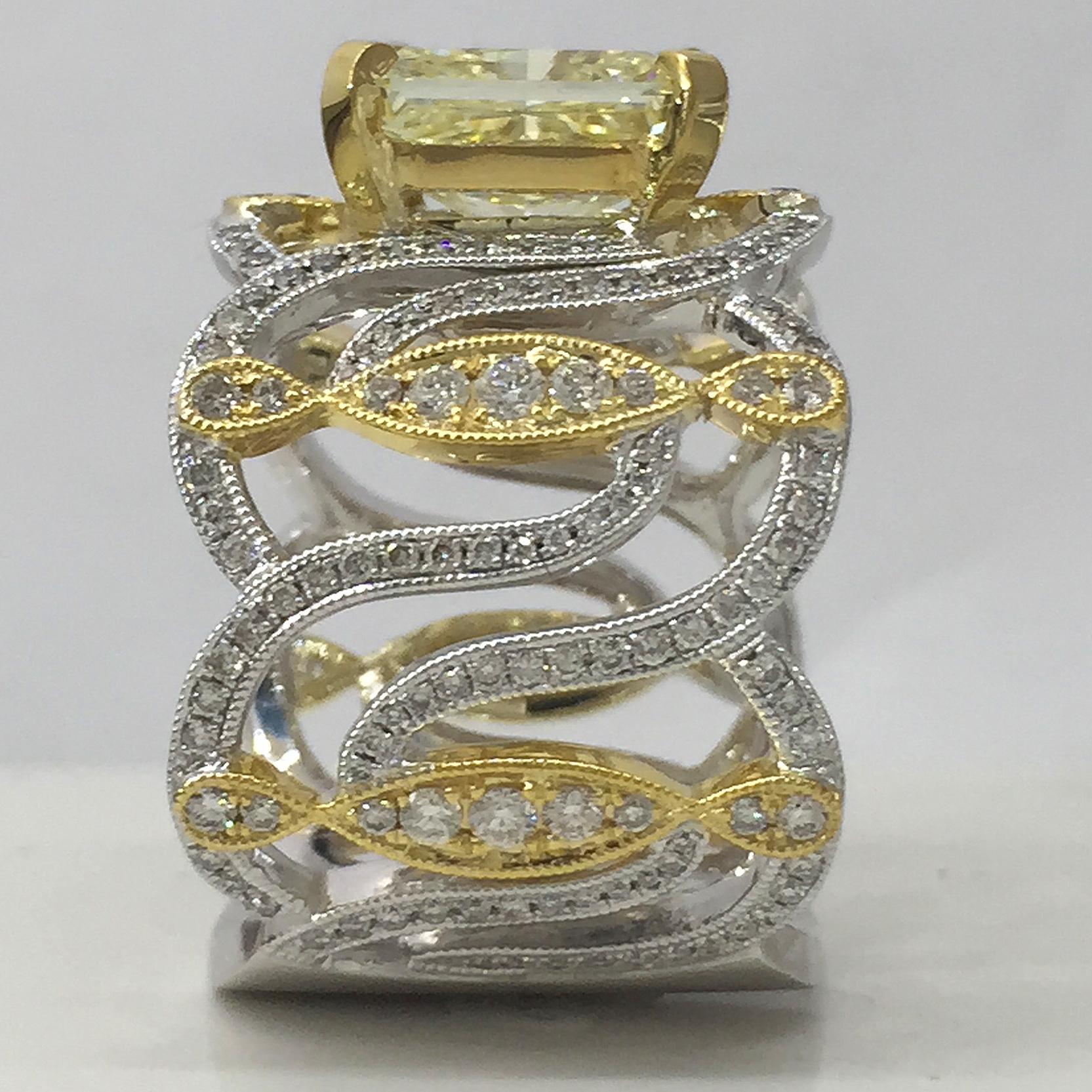 Modern 4 Carat Approximate Fancy Yellow Radiant and Diamond Ring-Ben Dannie For Sale