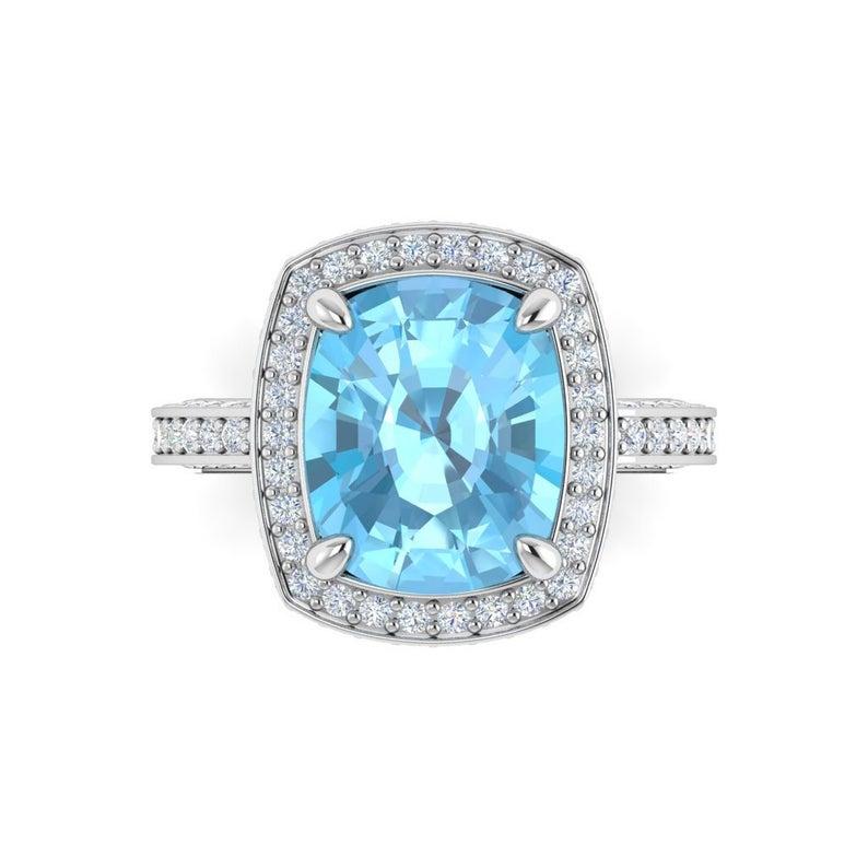 
This unique 4 Carat Aquamarine Ring with over 160 White Diamonds set in 14 Karat White Gold . Its in this Art Deco Style too 

Aquamarine with diamonds at each side and sparkling like a crystal clear ocean, it was believed to be the treasure of