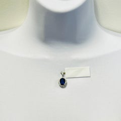 4 Carat Blue Sapphire Oval and White Diamond Pendant in Platinum