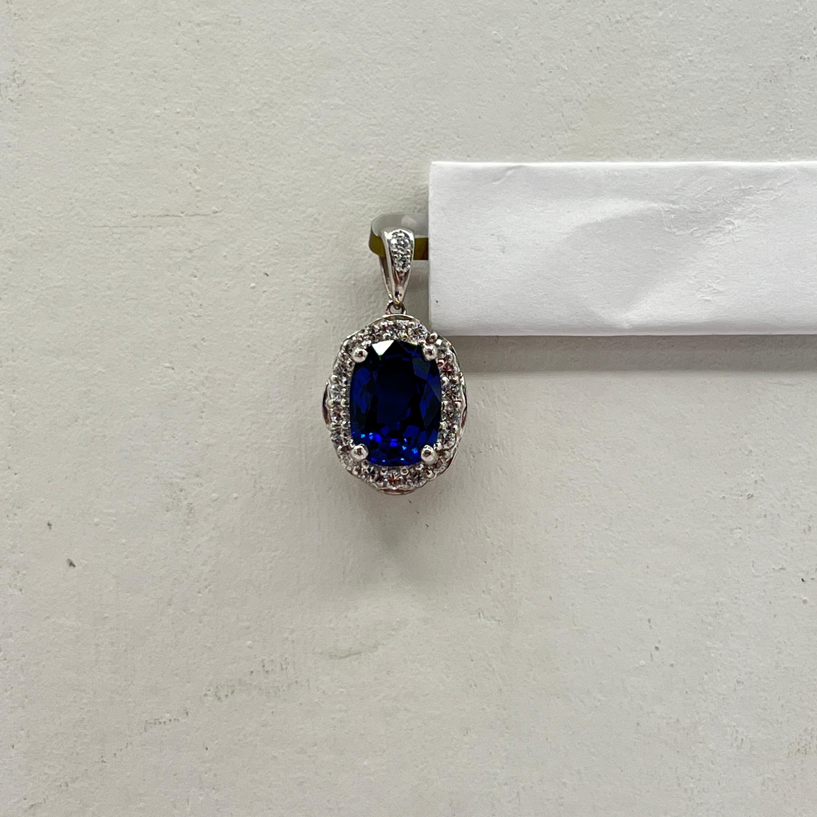 Women's or Men's 4 Carat Blue Sapphire Oval and White Diamond Pendant in Platinum For Sale