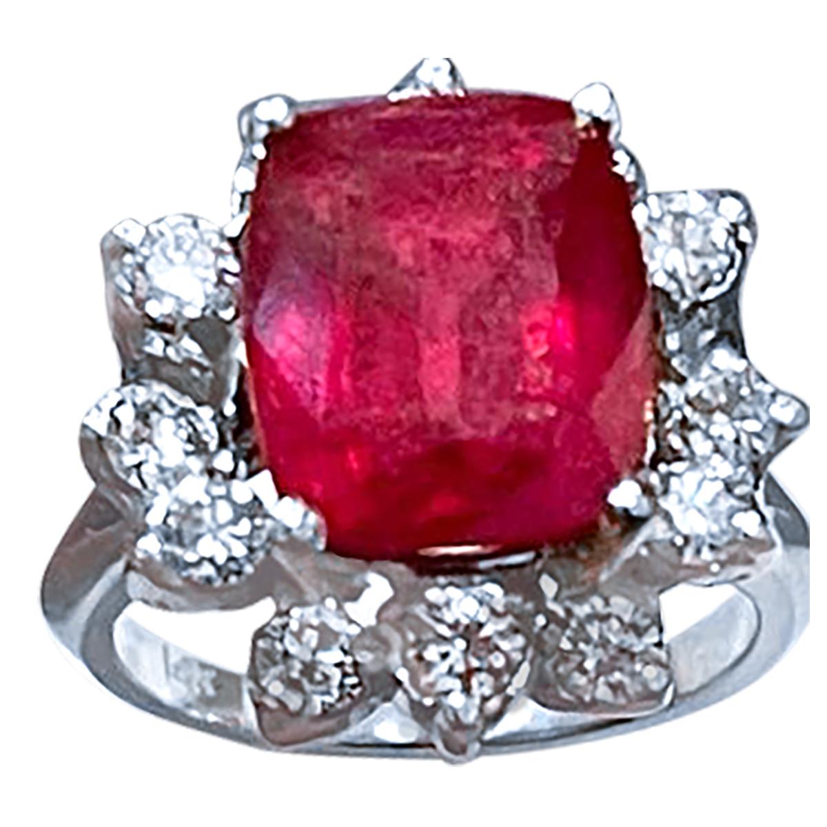 4 Carat Cushion Shape Treated Ruby and Diamond 14 Karat White Gold Ring Size 4.5
 prong set
14 K White Gold: 6.4  gram
Stamped 14K
Ring Size 4.5 ( can be altered for no charge )
Large approximately 4  carat Cushion shape ruby Treated surrounded by