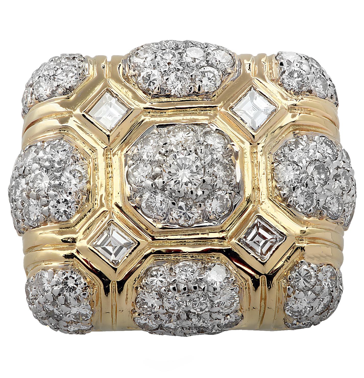  Striking cocktail ring crafted in 18 karat yellow gold featuring 107 round brilliant and asscher cut diamonds weighing approximately 4 carats total, G color, VS-SI clarity. This piece is rich in color with geometric shapes and clean, crisp lines